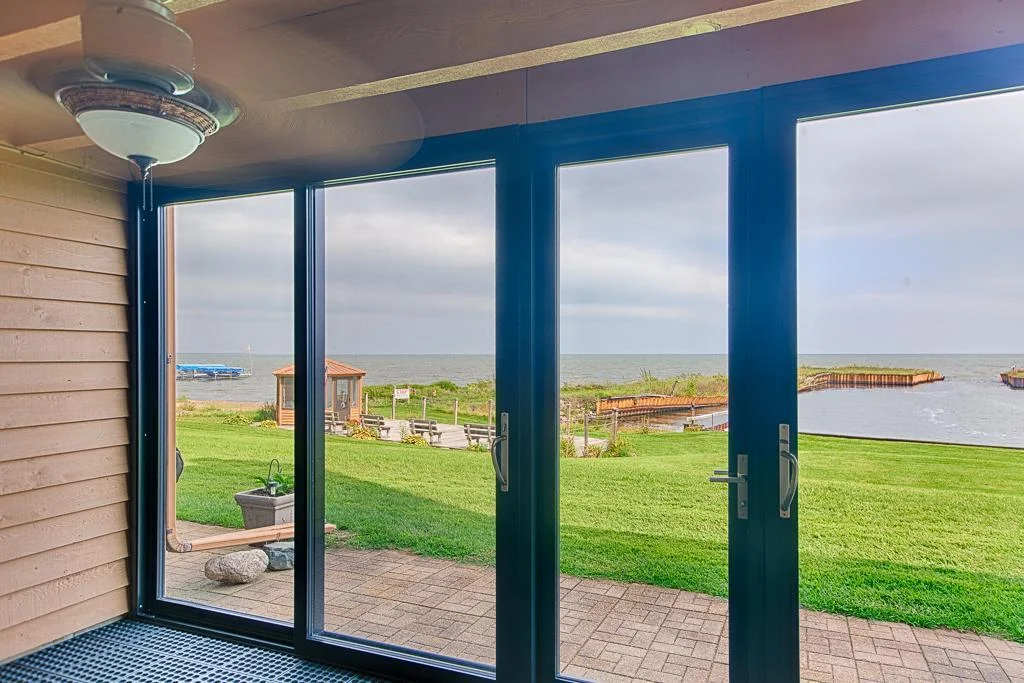 sunroom & patio walk-out to lake