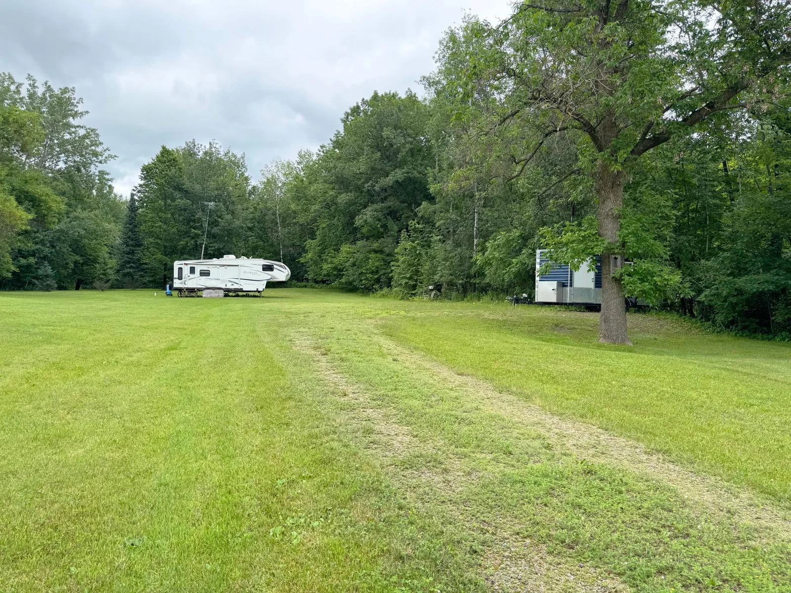 A shot of the property looking up the driveway.
