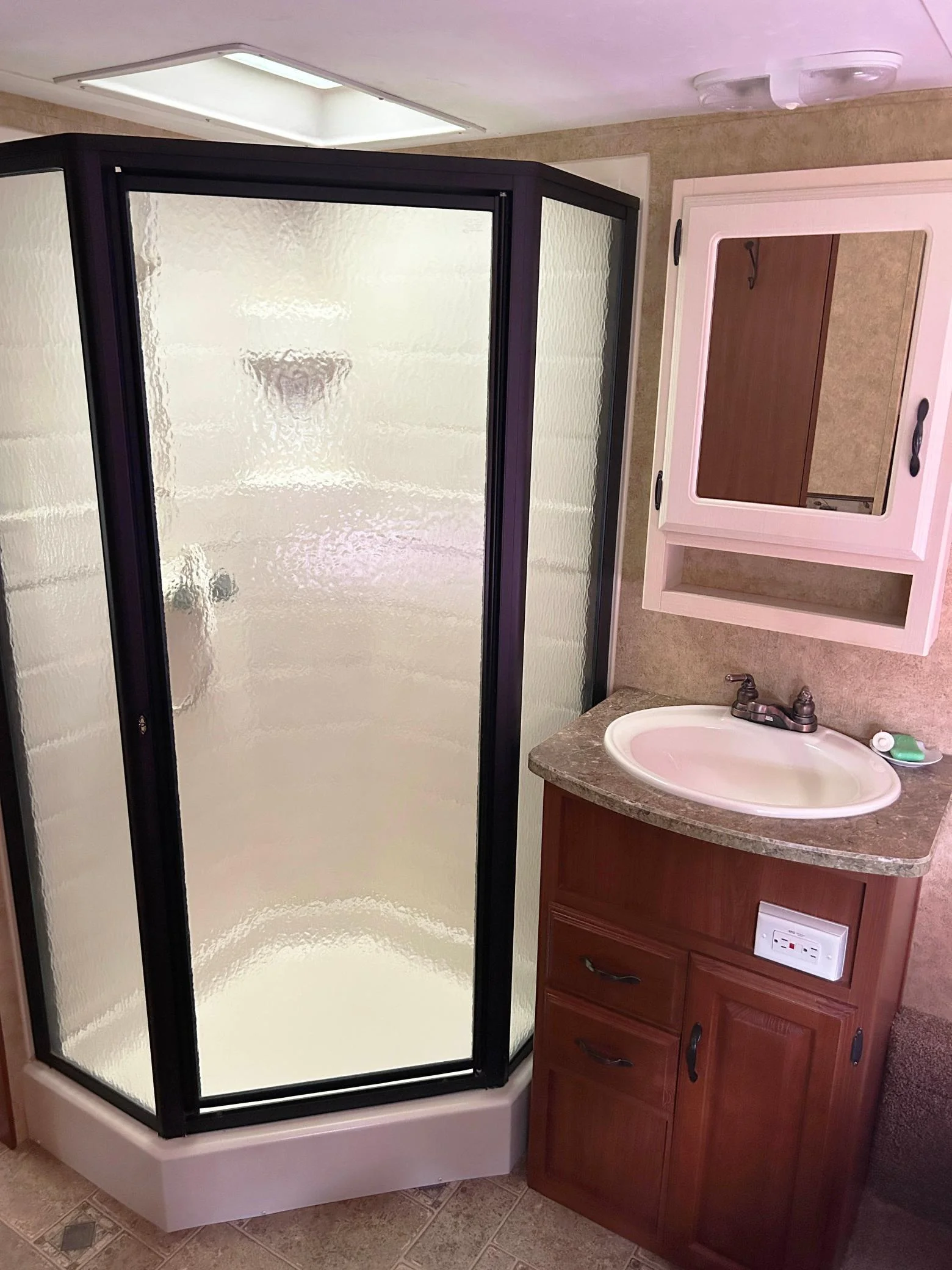 A peek into the bathroom. The bathroom quaters are inside the bedroom space.