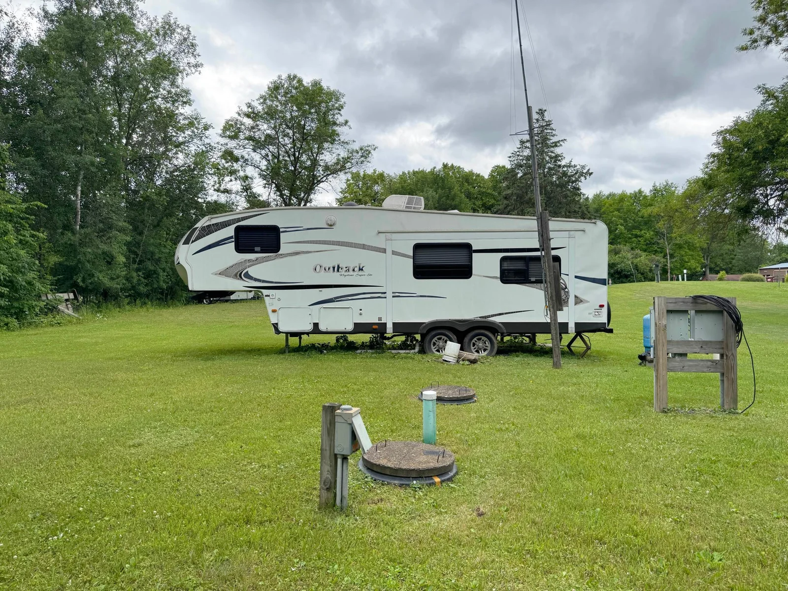 A shot of the camper's rear exterior featuring utilities.