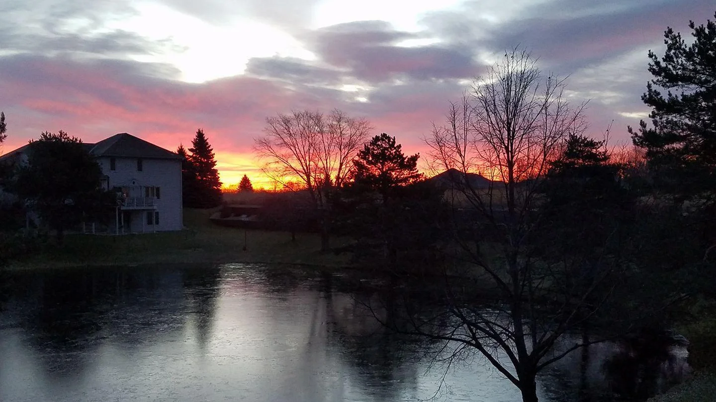 Seller submitted photo of sunrise over the pond!