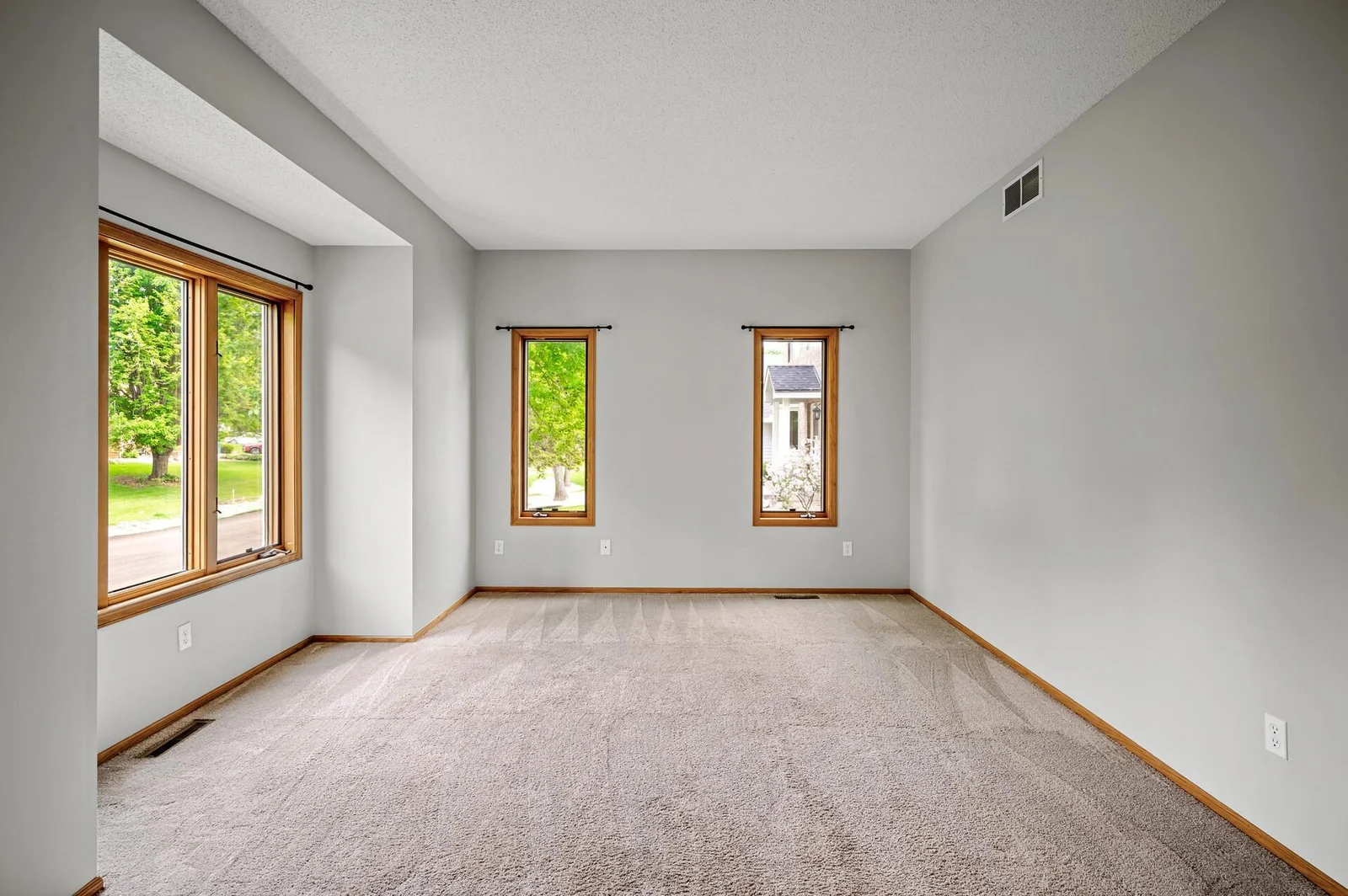 On the other side of the front door is your front room! Great for those needing an office space while working from home. Carpet has been professionally cleaned May 2025.