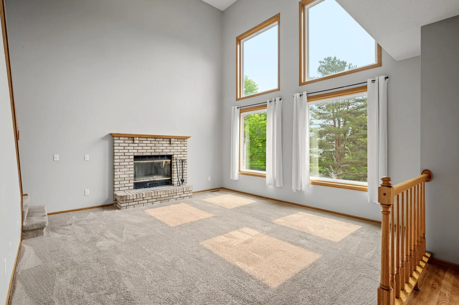 Your two-story great room has amazing views! Wood burning fireplace is great for those long Minnesota winters.