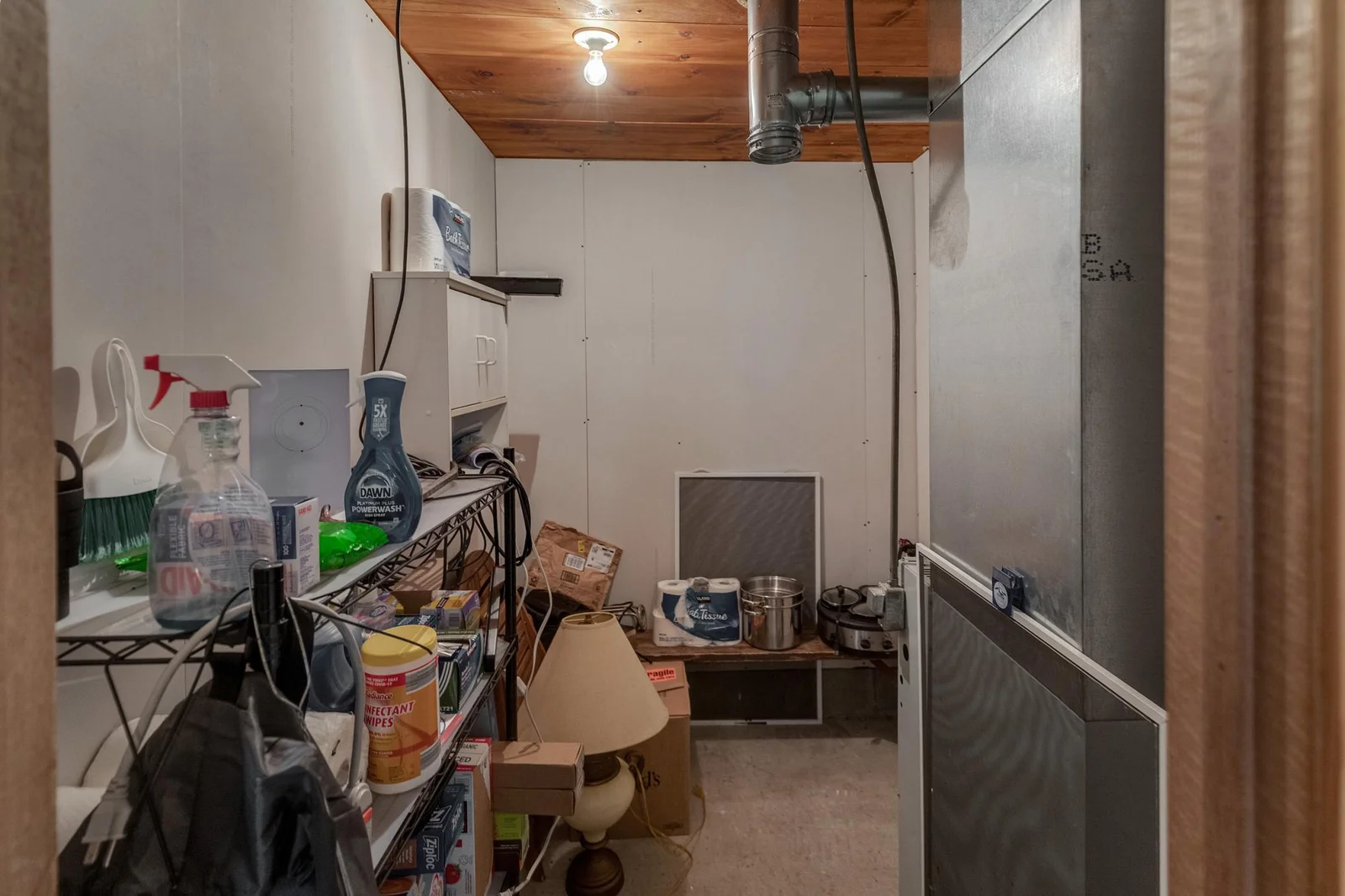 Utility room with forced air furnace