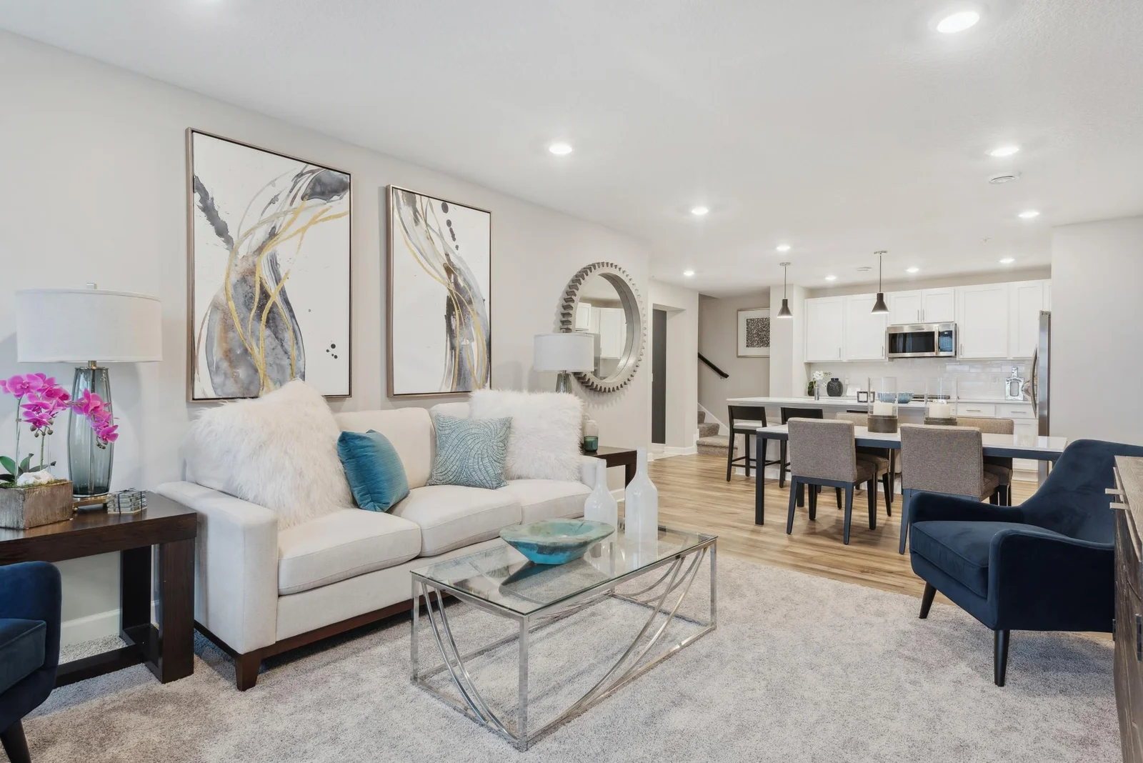 (Photo of decorated model, actual home's finishes may vary slightly) What a great floor plan! Don't miss a thing from the kitchen with this open space!