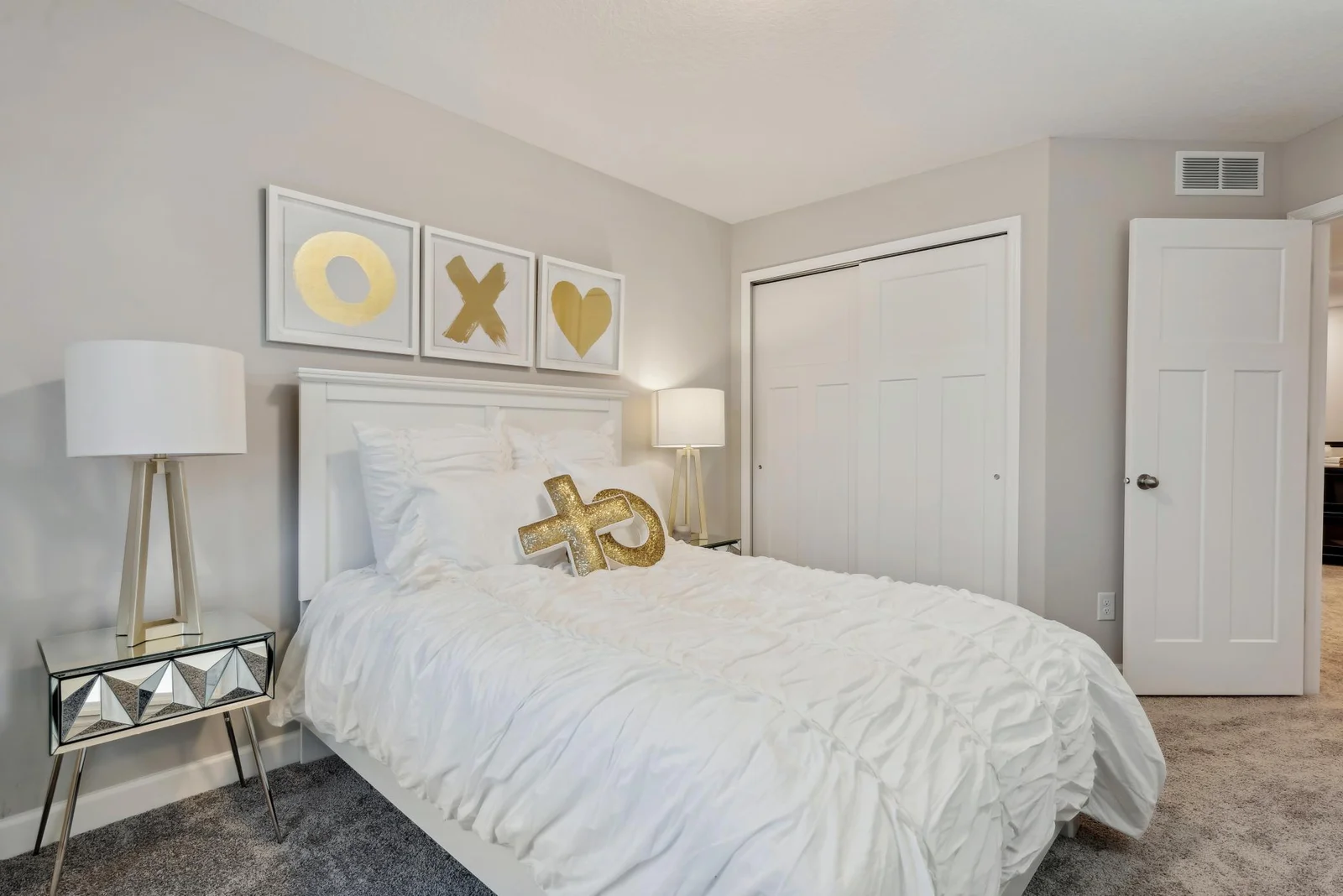 (Photo of decorated model, actual home's finishes may vary slightly) Another look at one of the secondary bedrooms. They can be utilized in versatile ways to fit your lifestyle needs!