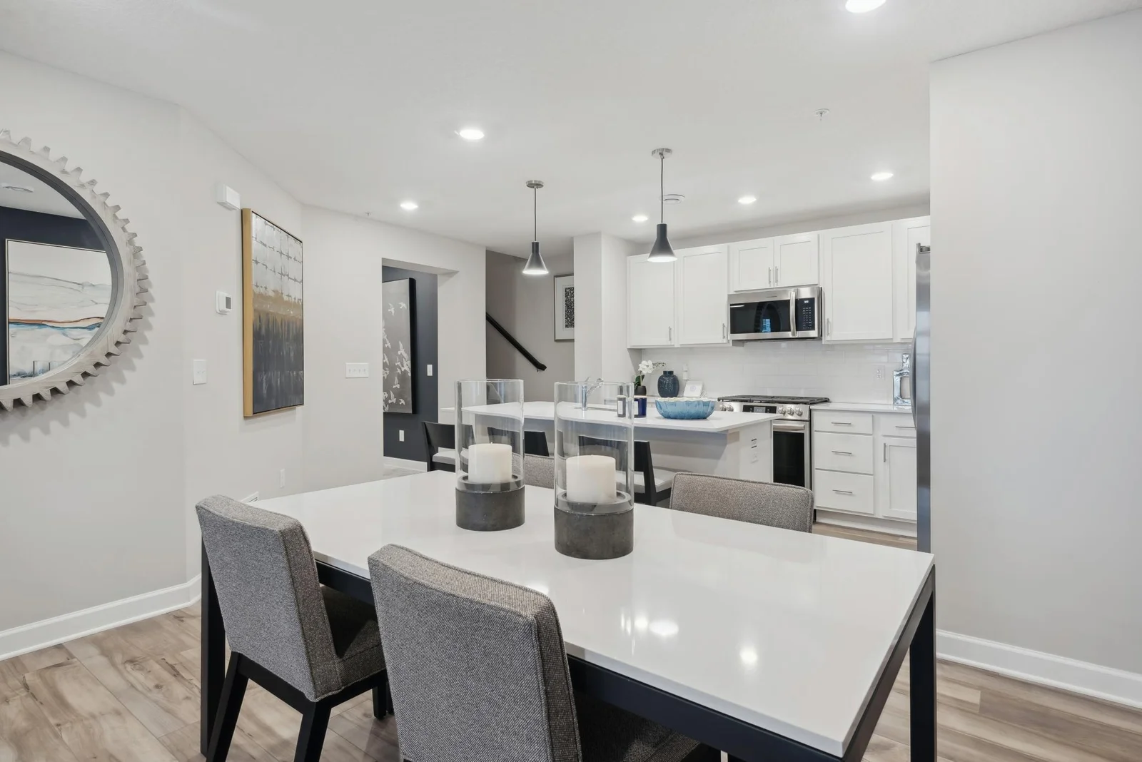 (Photo of decorated model, actual home's finishes may vary slightly) The eat-in dining room has ample space for a dining table located in the heart of the home.
