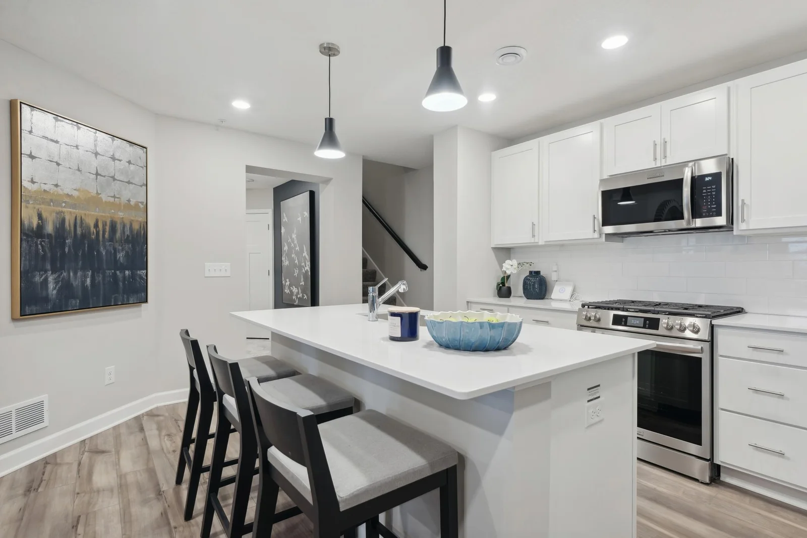 (Photo of decorated model, actual home's finishes may vary slightly) Desirably located center island that faces the dining and great room. Great for hosting and entertaining!
