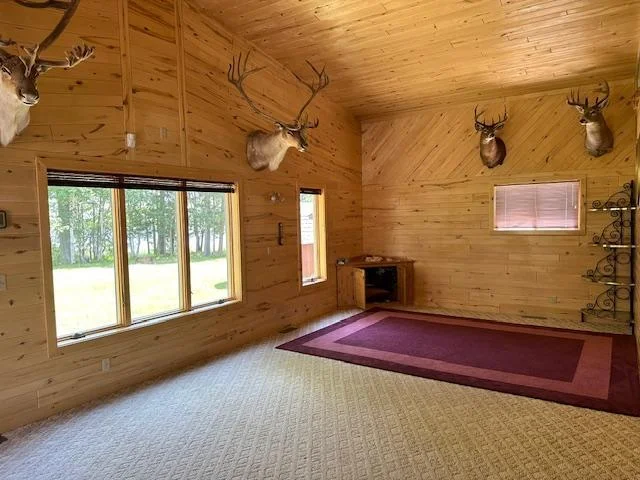 All windows lakeside in large Family Room