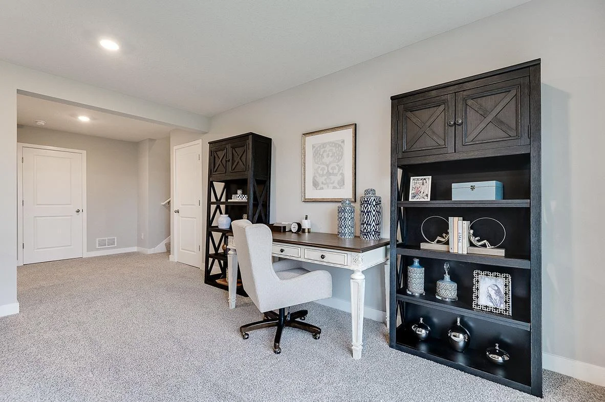 All of that living space up - plus this INCLUDED FINISHED lower level which features an over-sized bedroom with a walk-in closet, another full bathroom plus a giant family room! Photo of model, colors and options will vary.