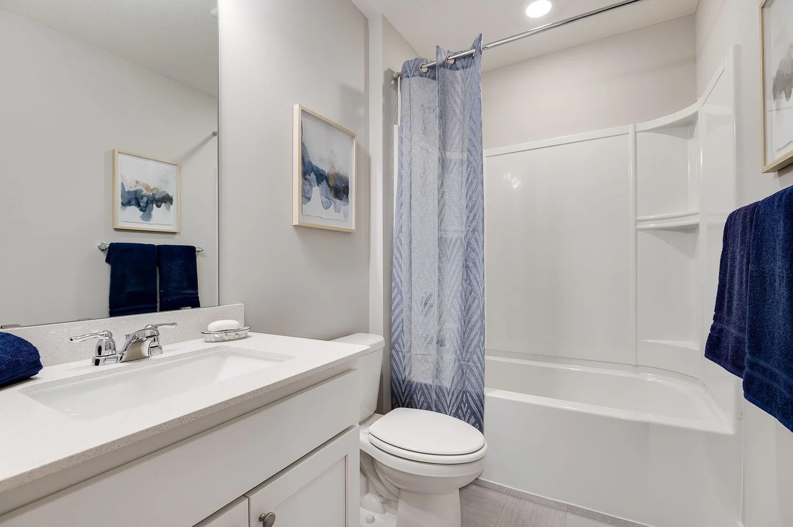The Cameron II offers a full bath on both upper and lower levels.  Photo of model, colors and options will vary.