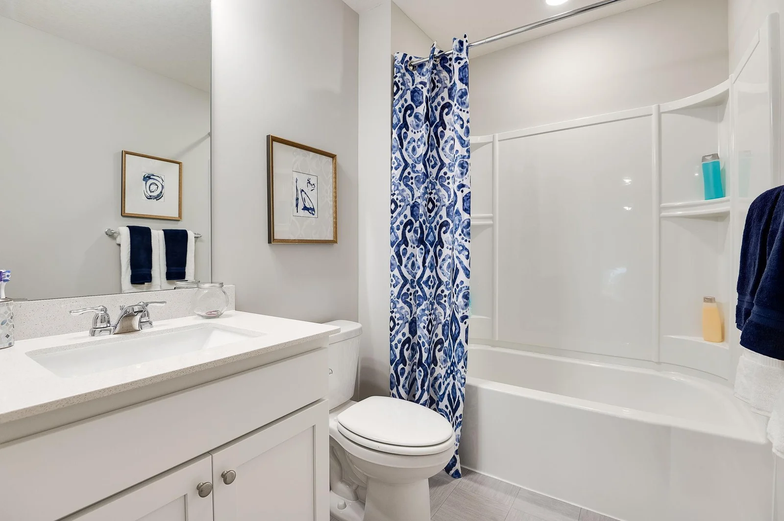 The Cameron II offers a full bath on both upper and lower levels.  Photo of model, colors and options will vary.
