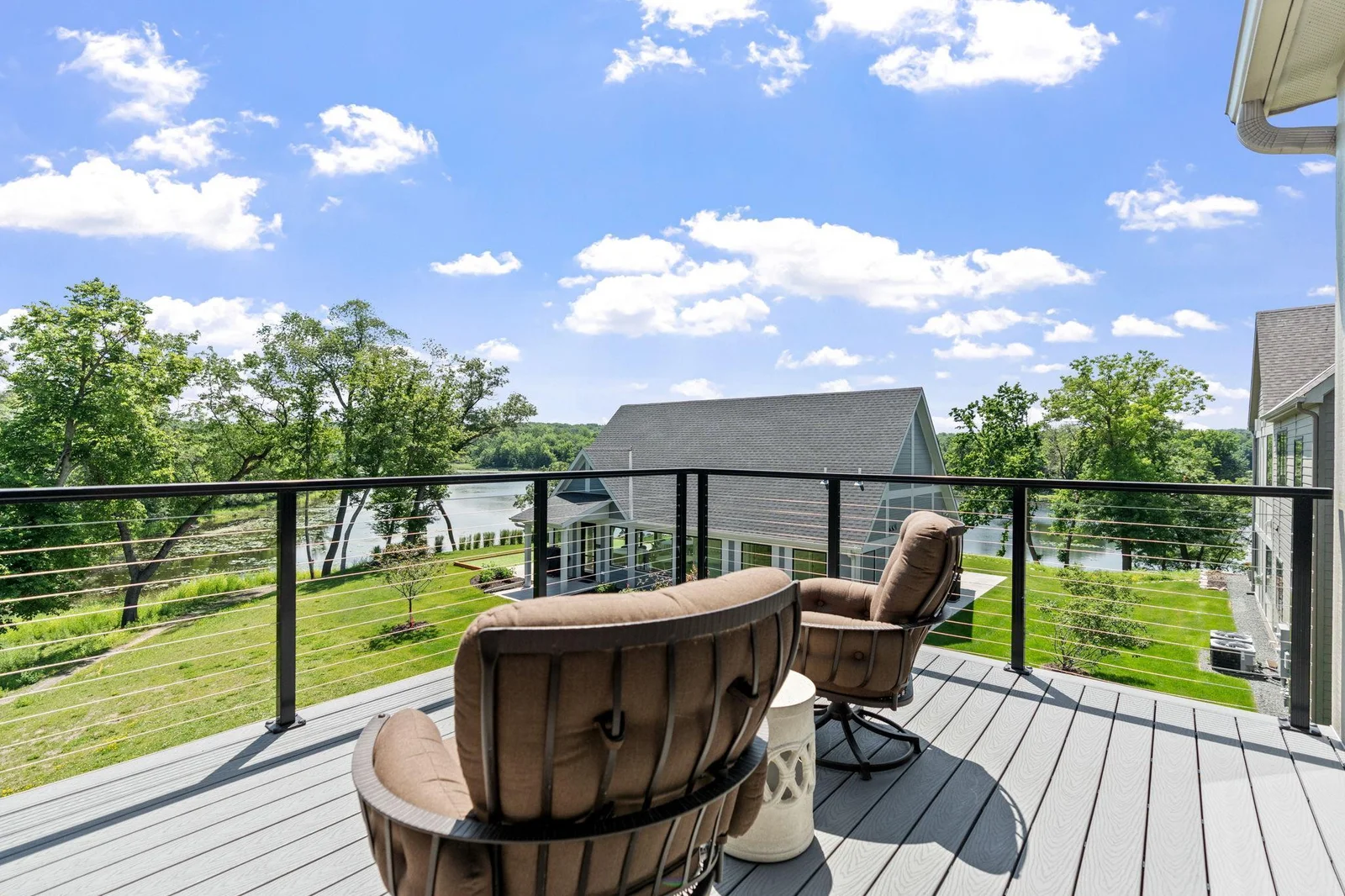Deck features maintenance free decking and cable railings. Treetop views of the Linden Cove community space and Murphy Hanrehan Park