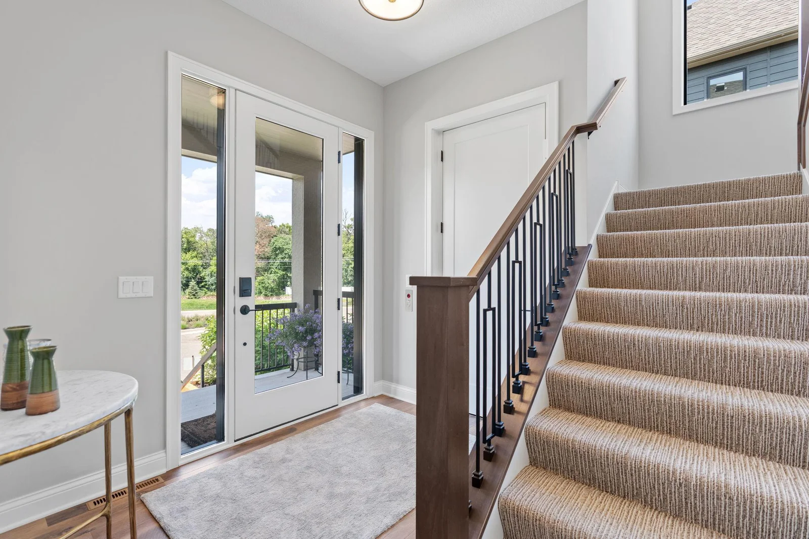 Entry street level features open staircase or elevator access to the Main Level
