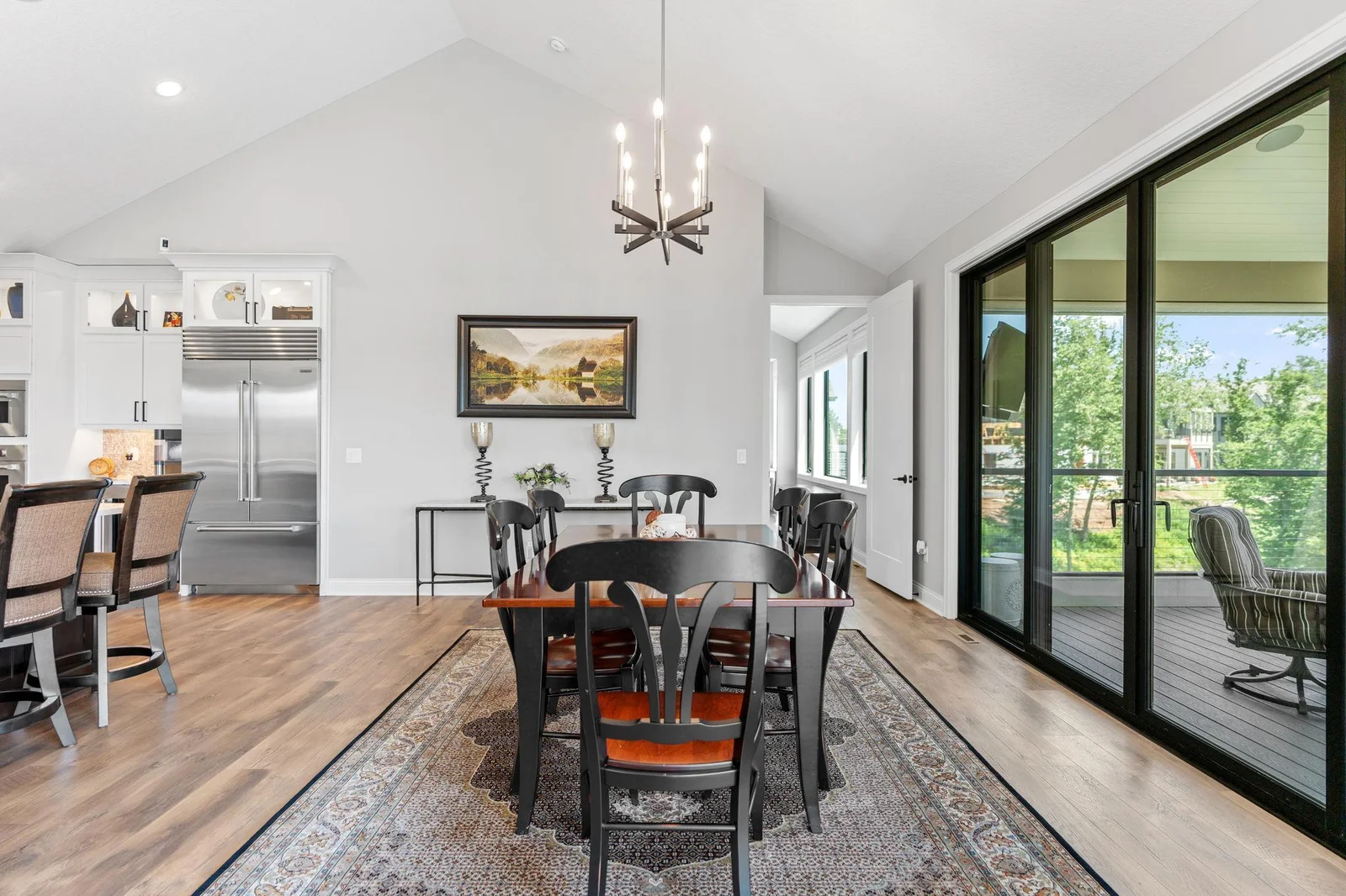 Dining Room features 4 Panel patio door with access to the porch and deck