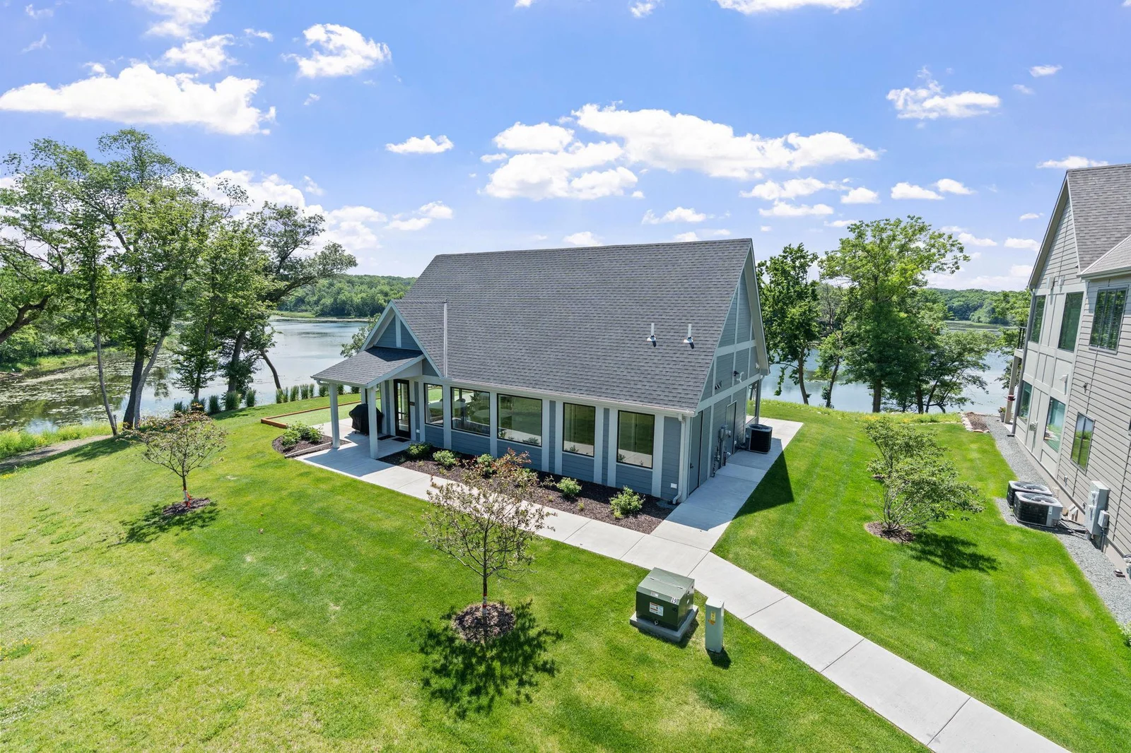 Association Clubhouse offers a spacious full kitchen, multiple dining tables, additional flex space and restrooms. Great for meeting with neighbors, private parties!