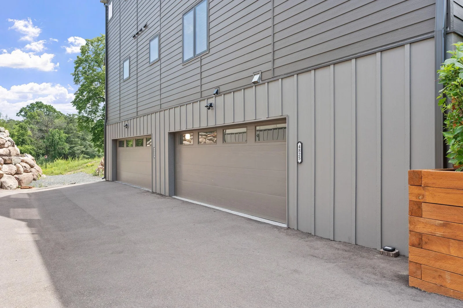 Tuck Under 2 Car garage with additional guest parking