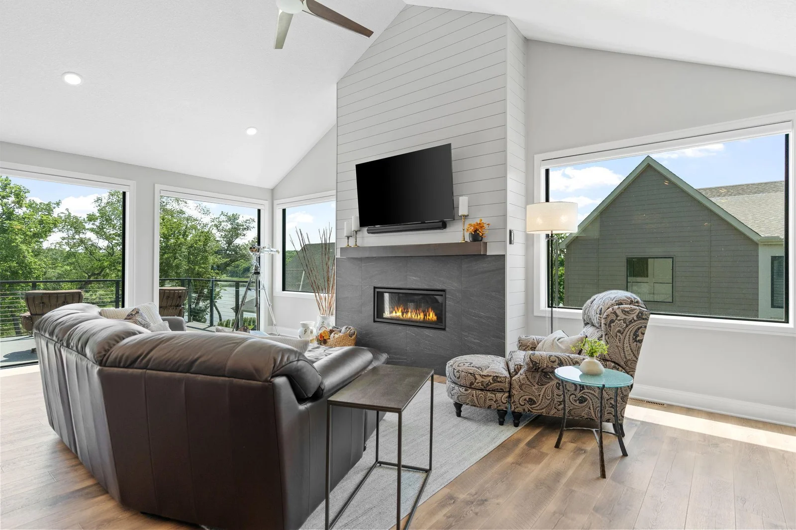 Floor to ceiling windows provide panoramic views of Hanrehan Lake