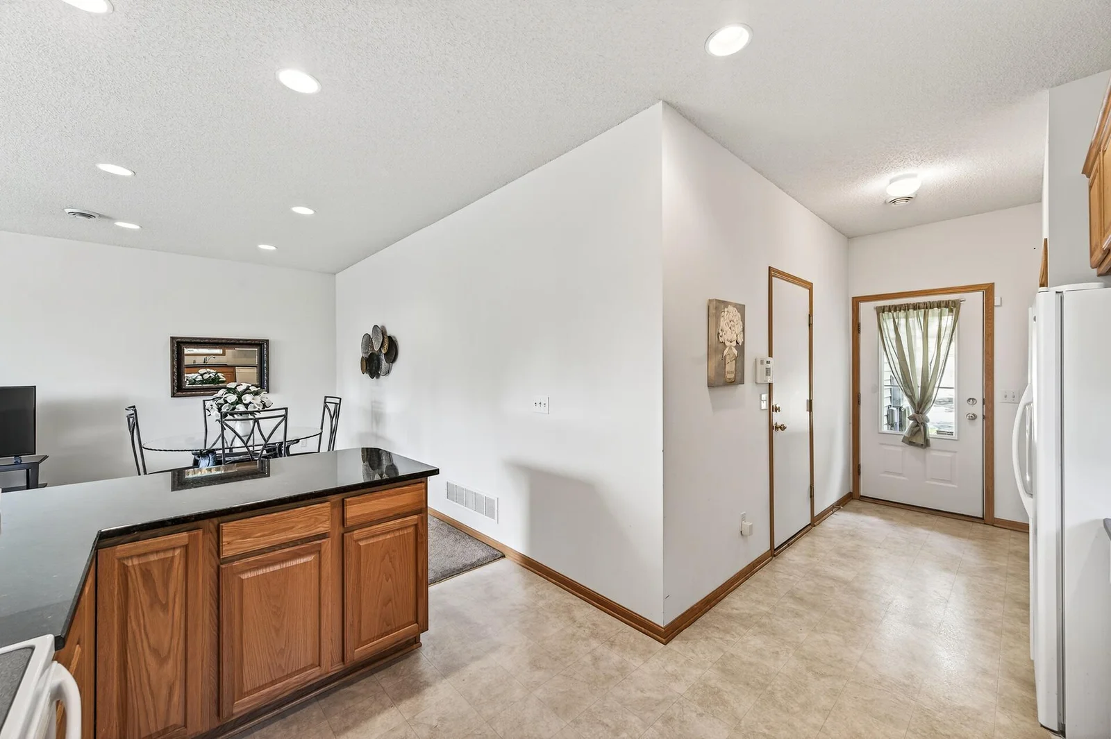 View to the back door and garage