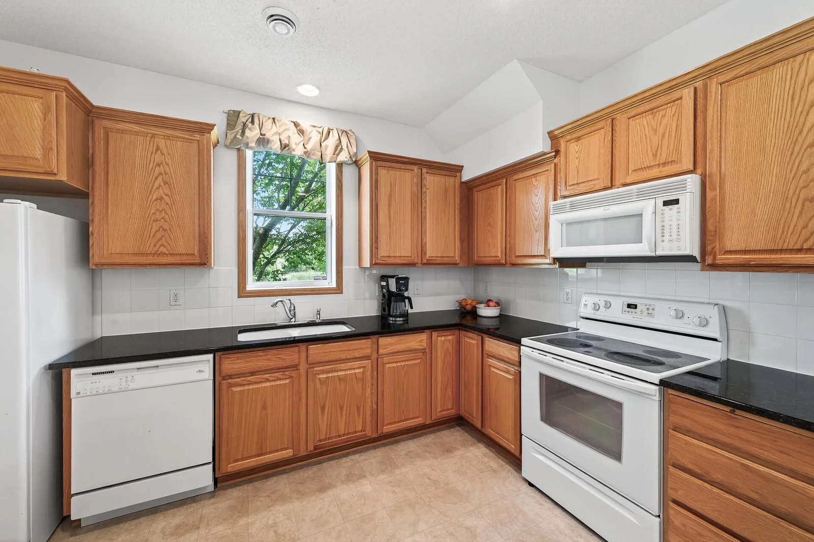 Beautiful kitchen with oak cabinets