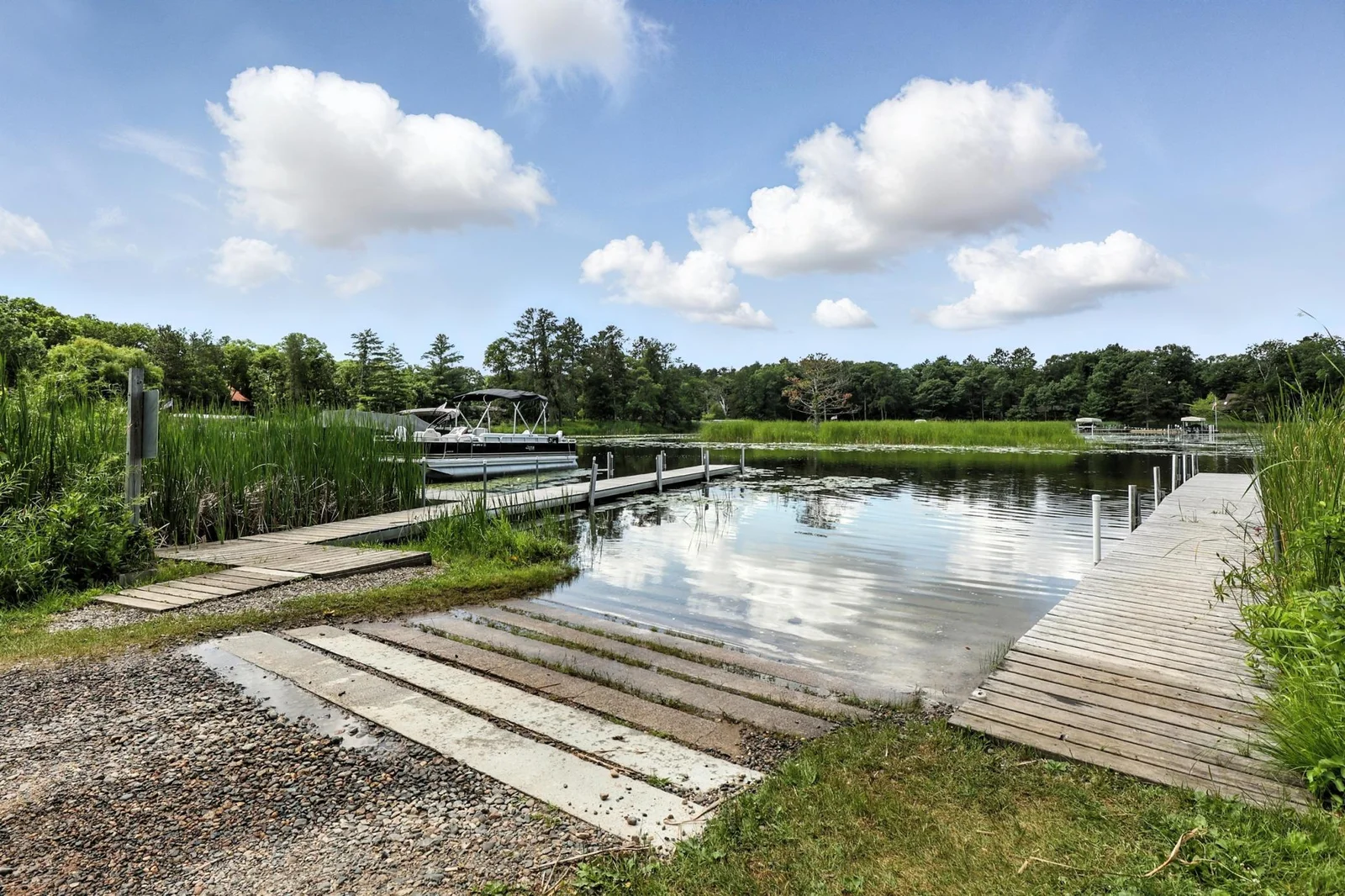 Launch with ease from your community boat ramp with day dock access—perfect for quick trips on the Whitefish Chain.