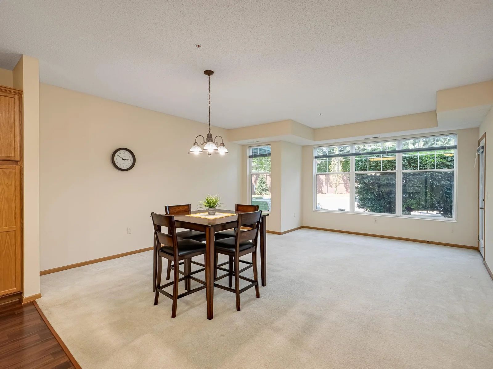 Dining area with open floor plan and great view of courtyard garden.