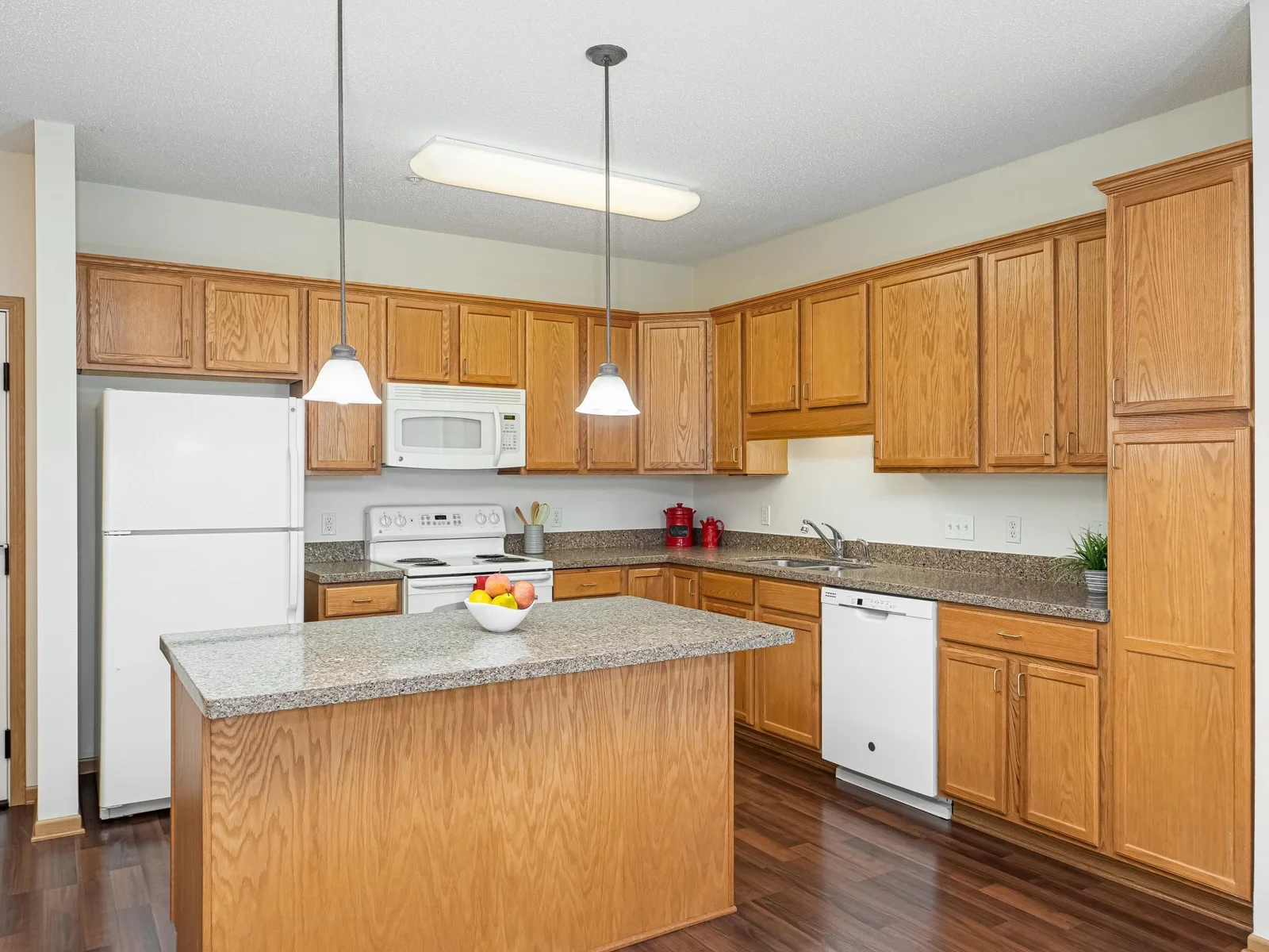 Granite kitchen with island.