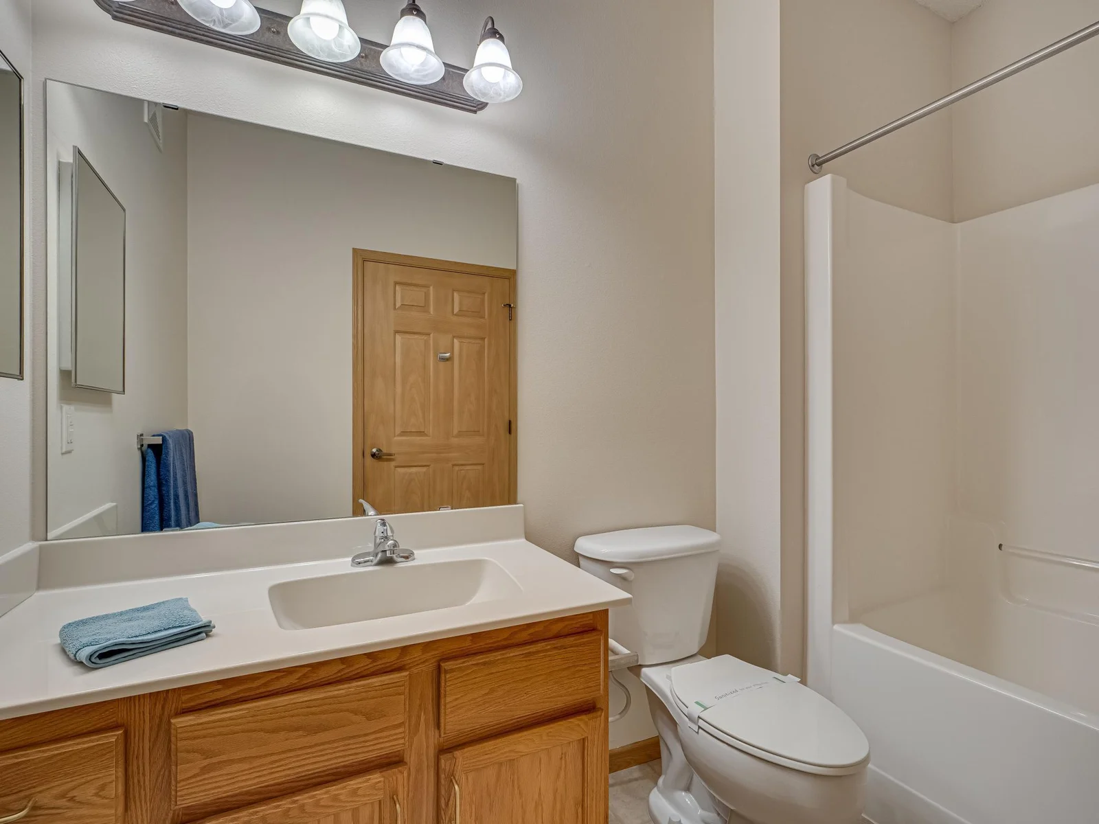Main bathroom with full tub.