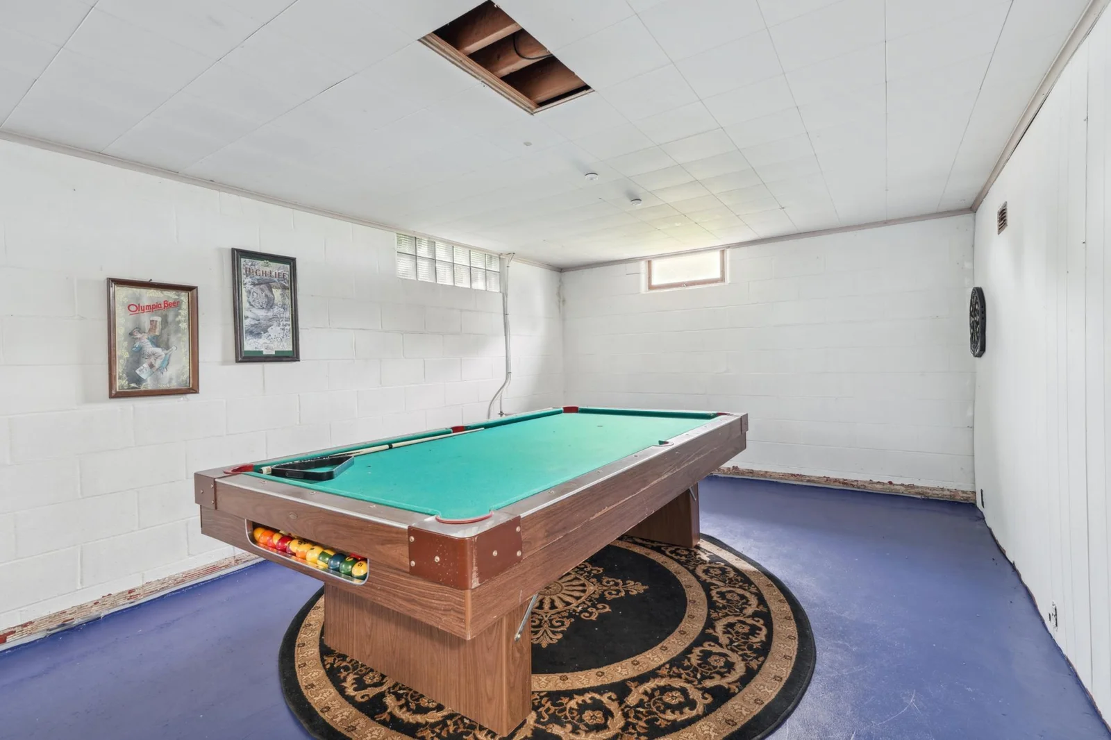 The family room in the lower level. The pool table is included!