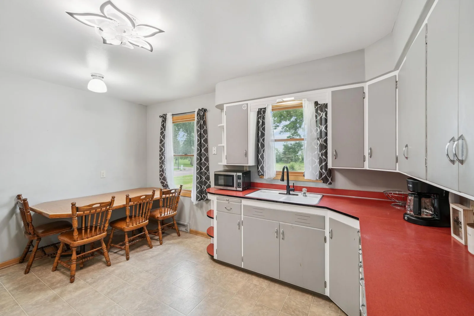 Another view of the kitchen and dining area.