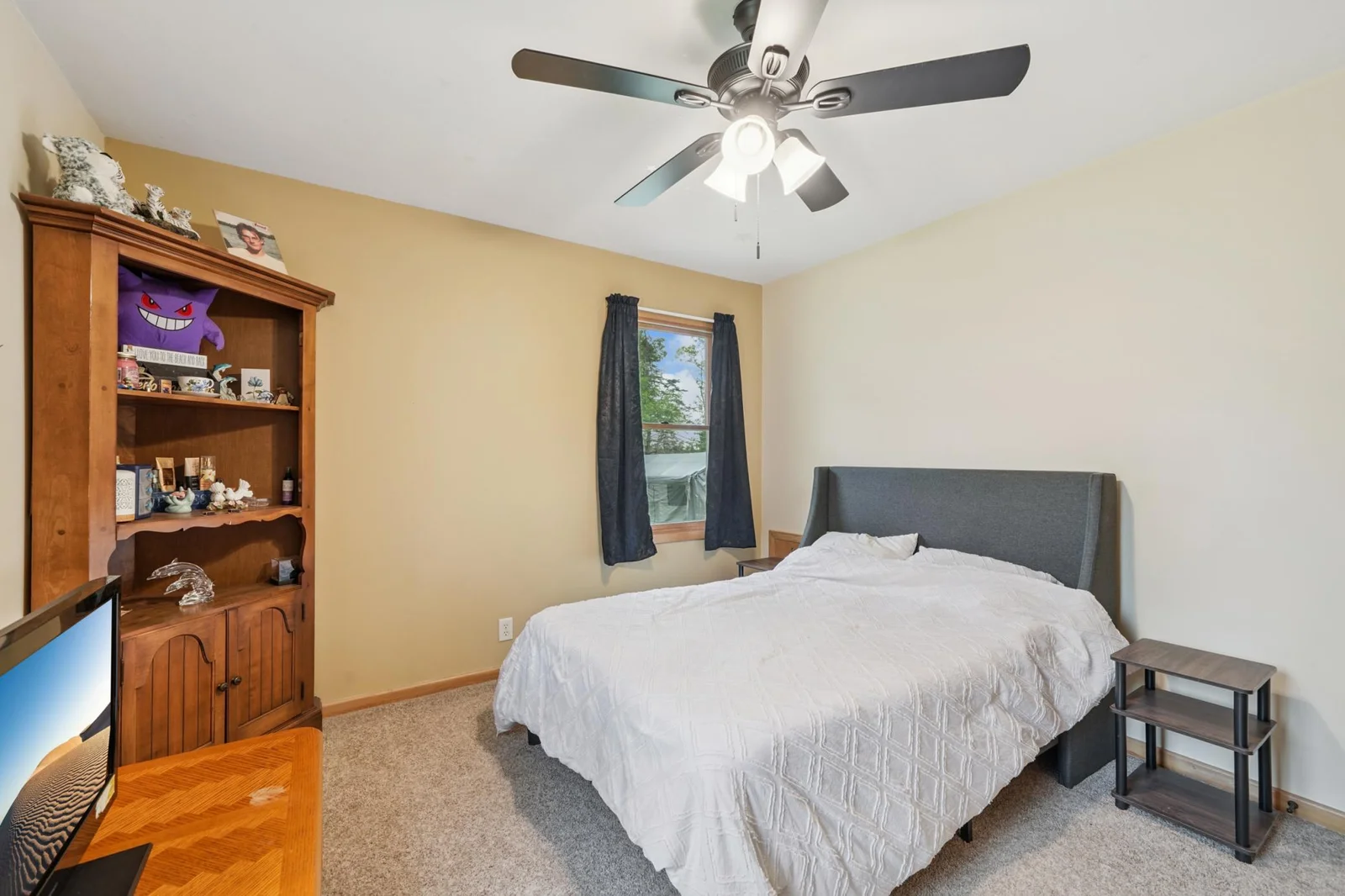 The first of two main floor bedrooms.