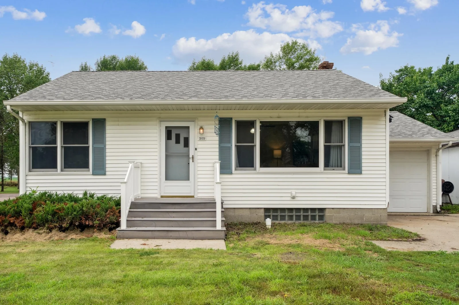 Home features maintenance free vinyl siding.