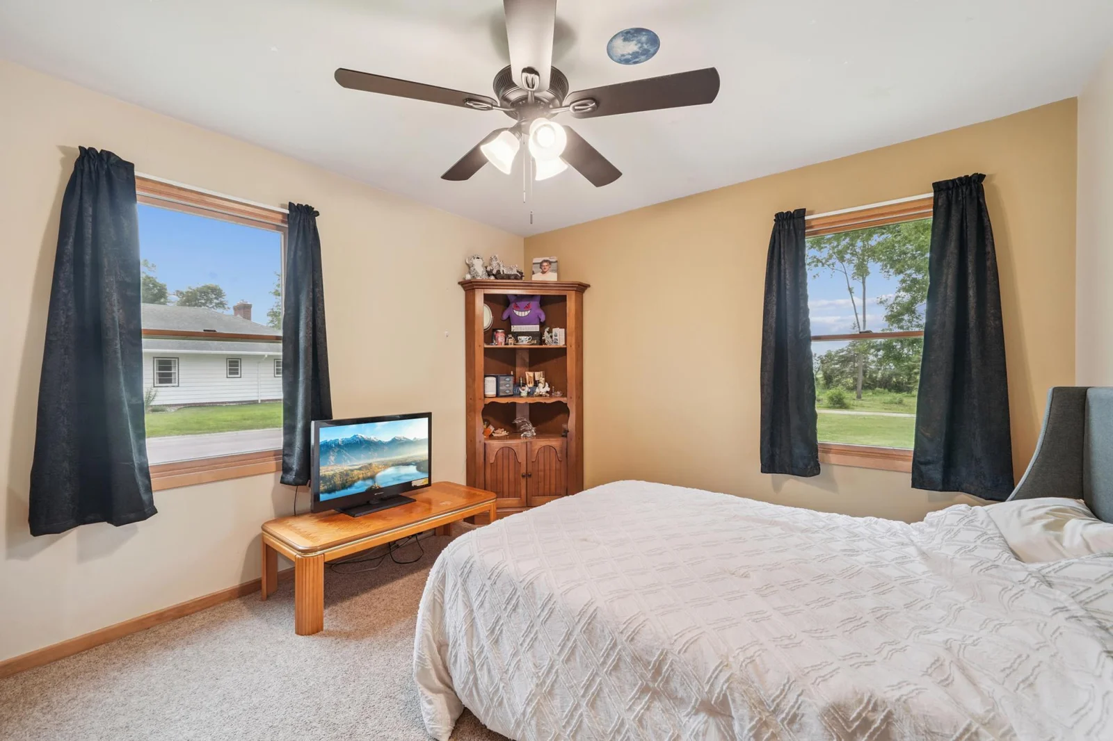The first of two main floor bedrooms.