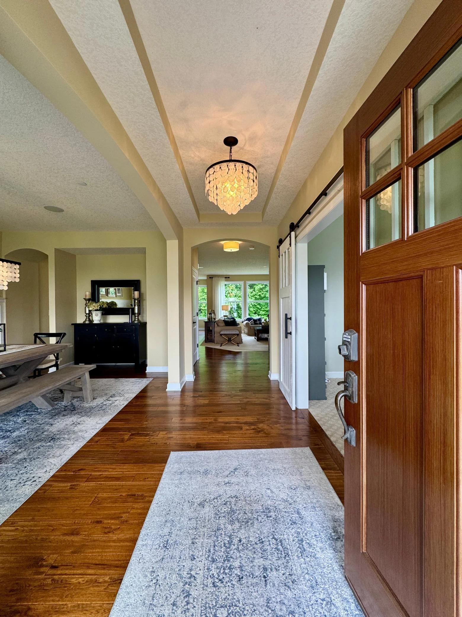Step inside and be greeted by a bright, welcoming foyer that sets the tone for the entire home.