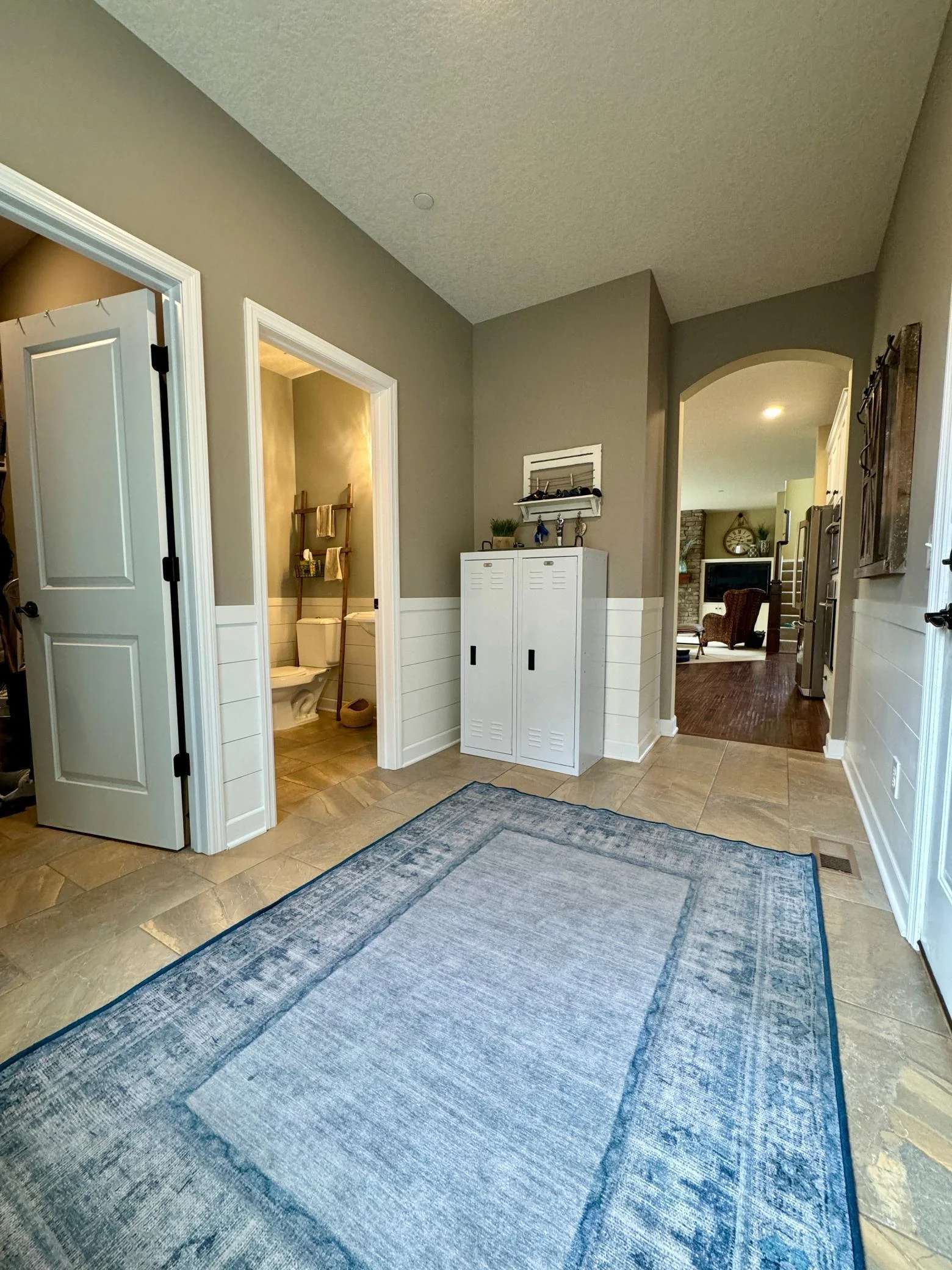 Thoughtfully planned half bath right off the mudroom is perfectly located.