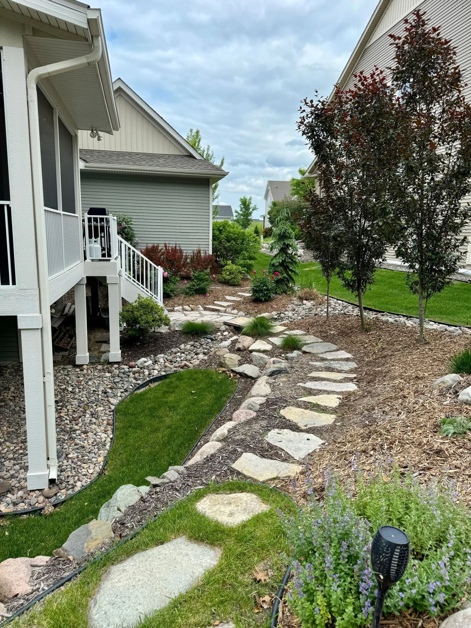 The professionally landscaped yard adds tons of character!