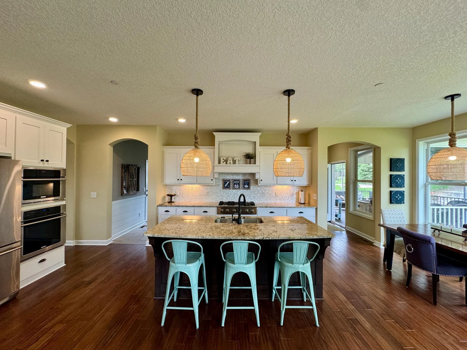 The "elite kitchen" package offers upgraded appliances, raised panel custom cabinets, pull out shelves, under cabinet lighting and more!