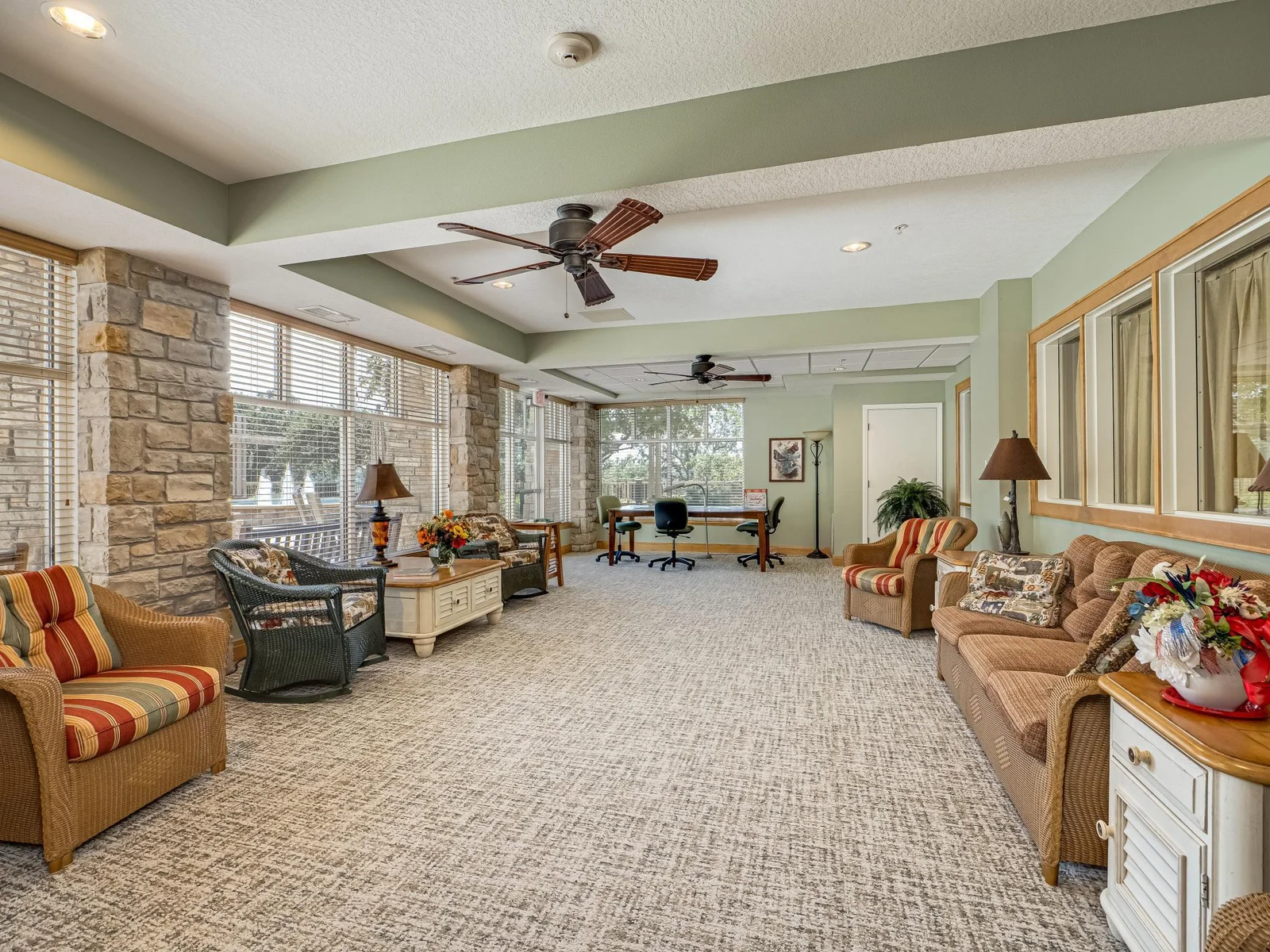 The sunroom is a great place to relax with friends, old and new.