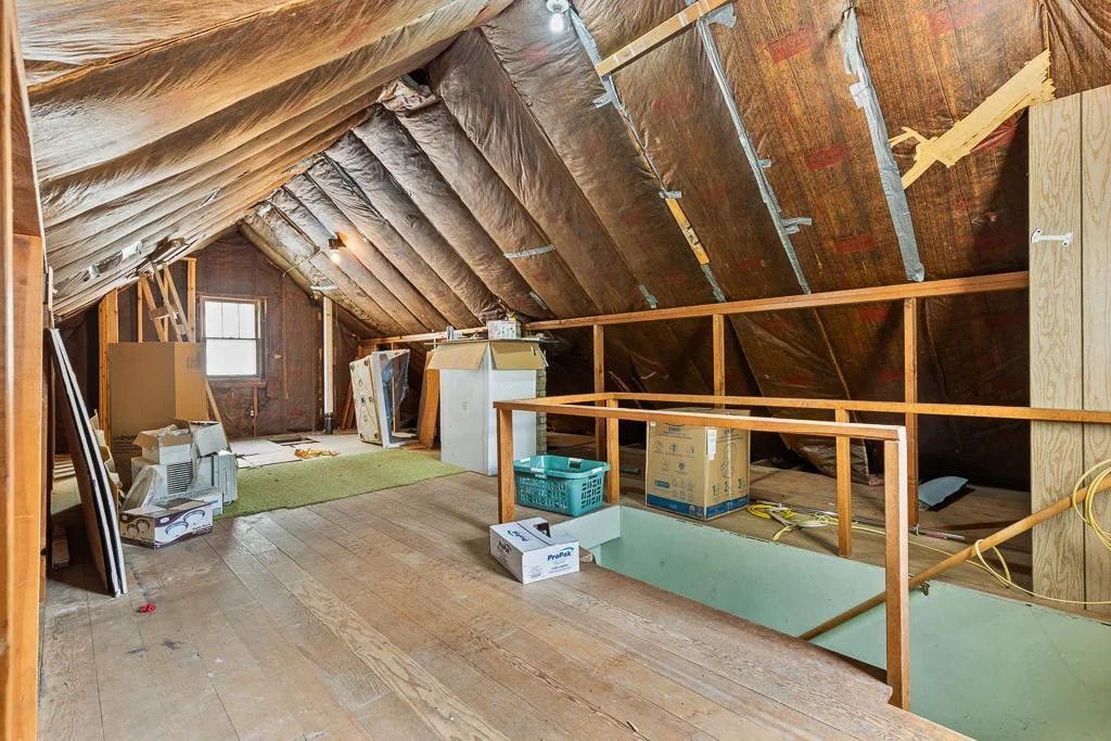 Upstairs is a large, unfinished space that is ready for your final touches! This would be a great, spacious primary bedroom, play room, guest suite, or just offers a great storage space.