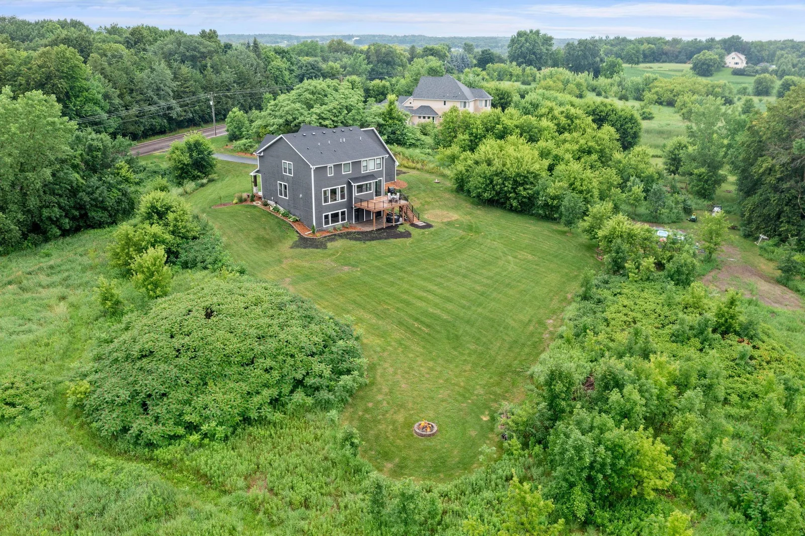 Don’t miss the chance to own this stunning custom-built home situated on 5 acres of beautiful land!