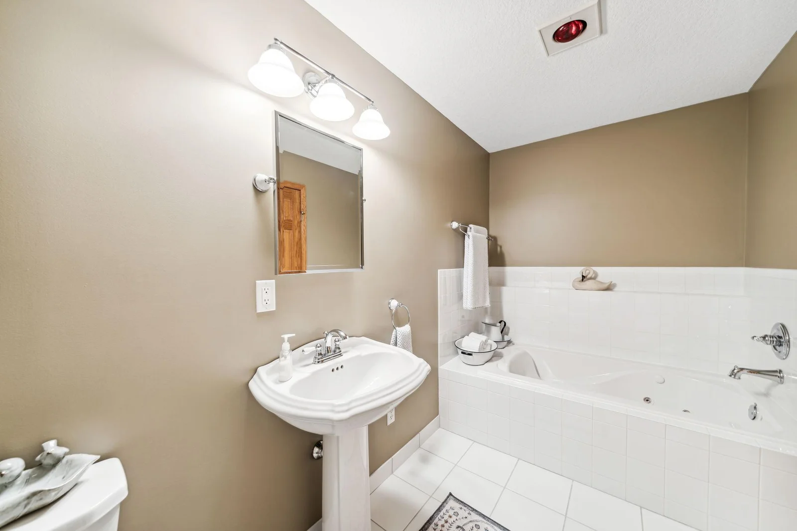 Bathroom with large soaking tub.