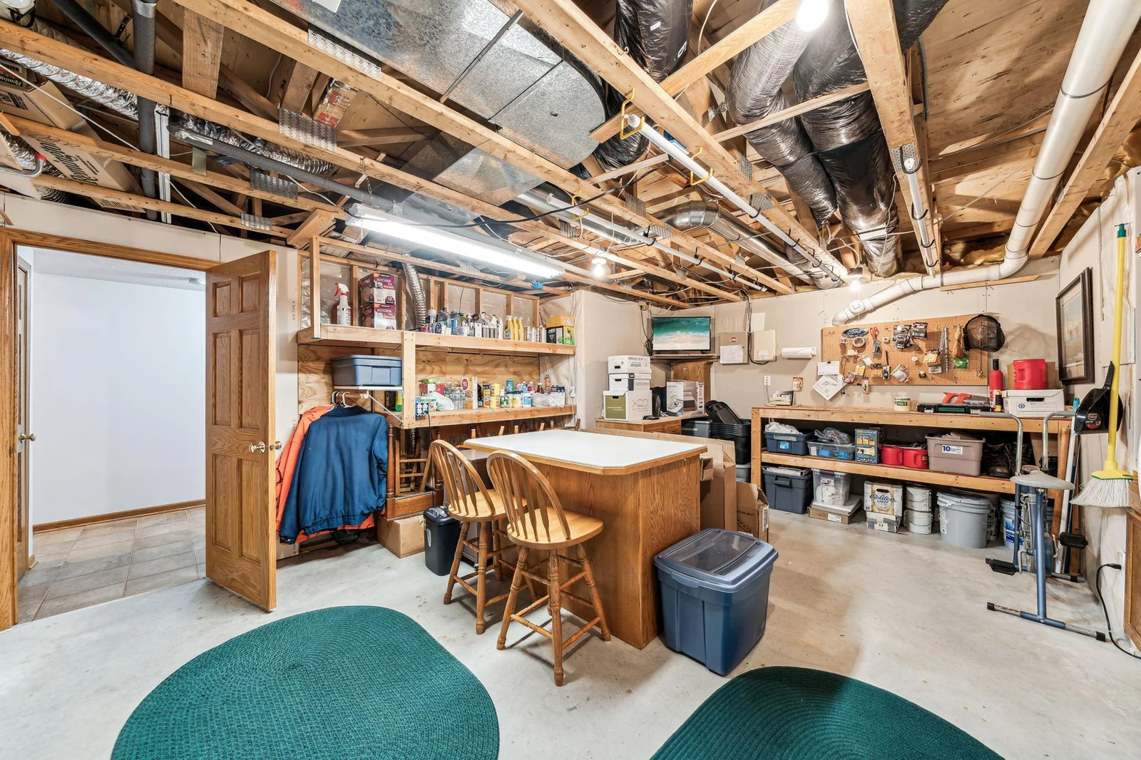 Large lower level storage room could be finished for another room if needed, or use for ample storage.