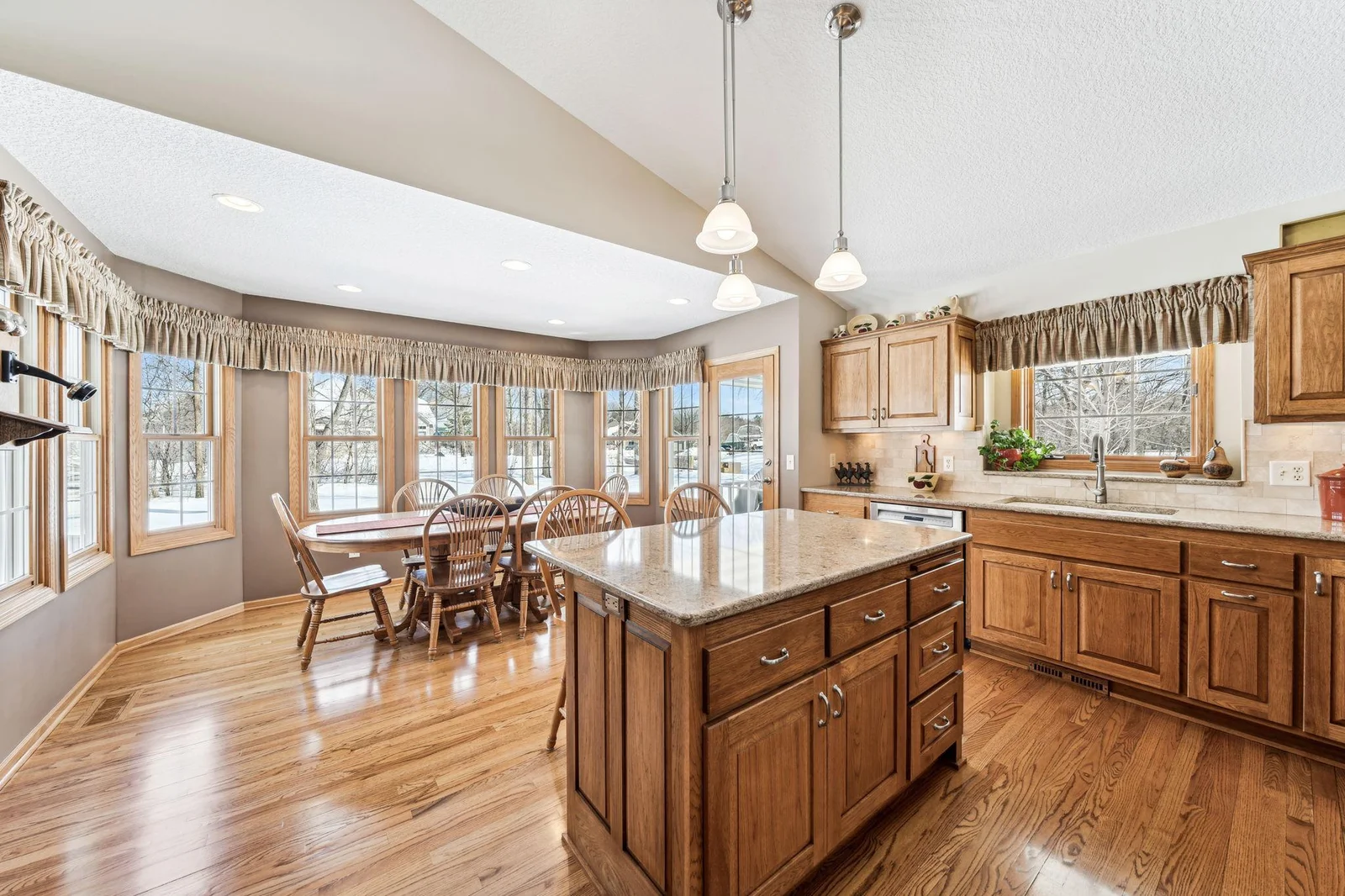 Kitchen has a nice sized center island and open to the dining room space / breakfast room.