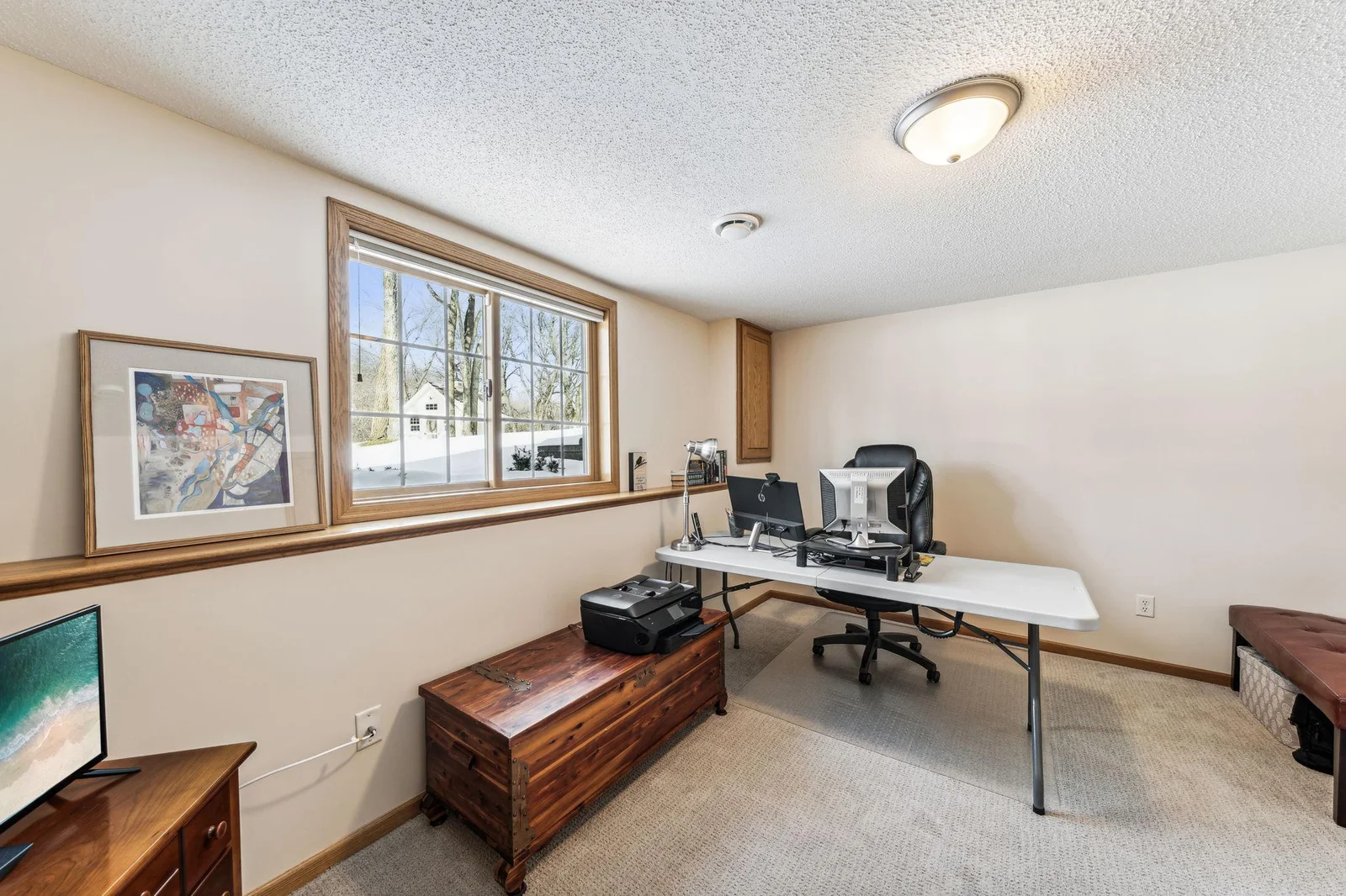 Lower level bedroom is currently used as an office.
