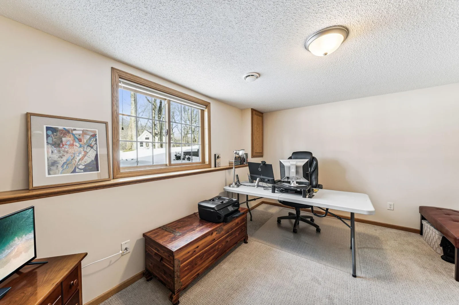 Lower level bedroom is currently used as an office.