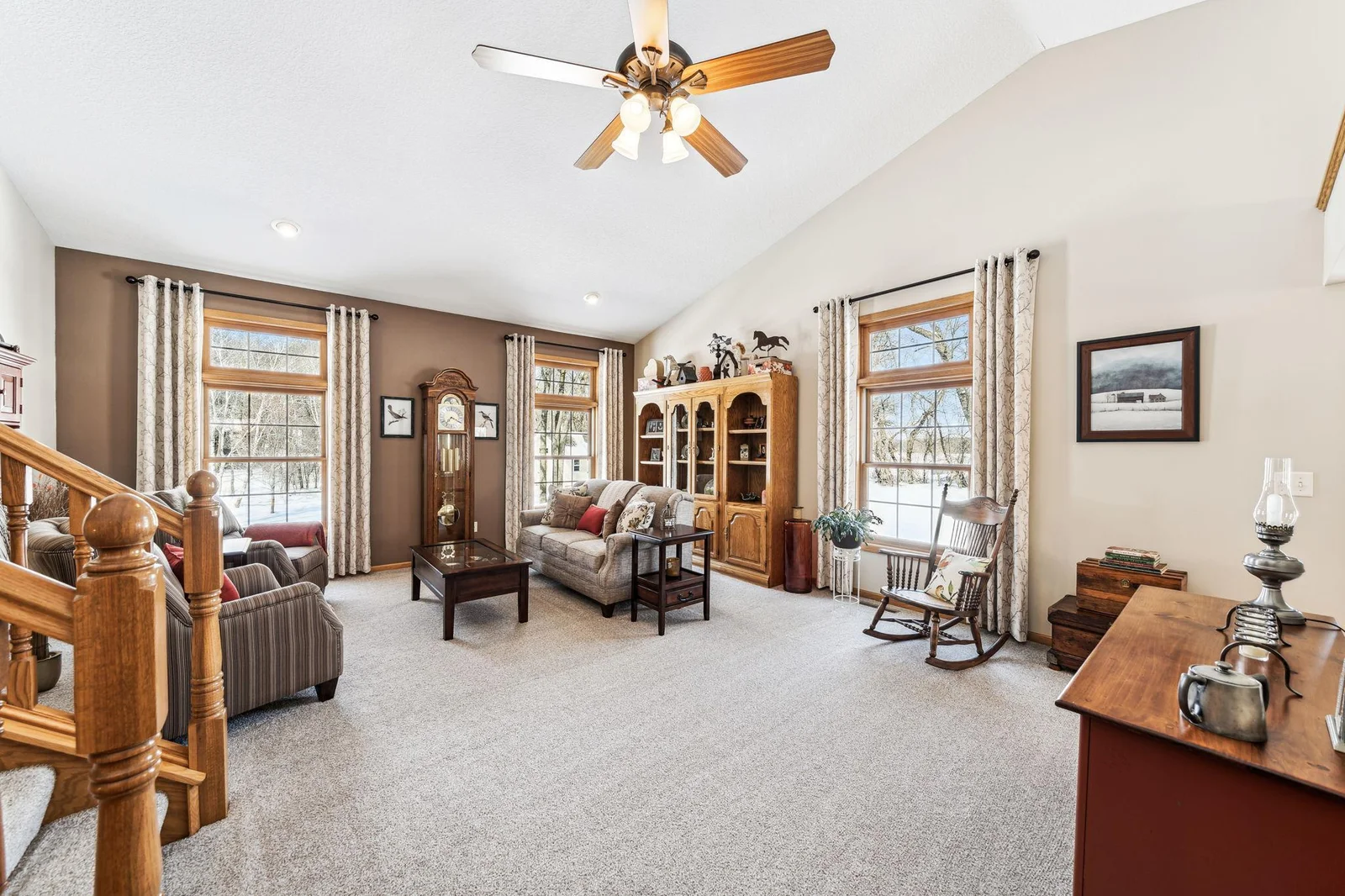Large windows overlooking the back and side yards with ample privacy.