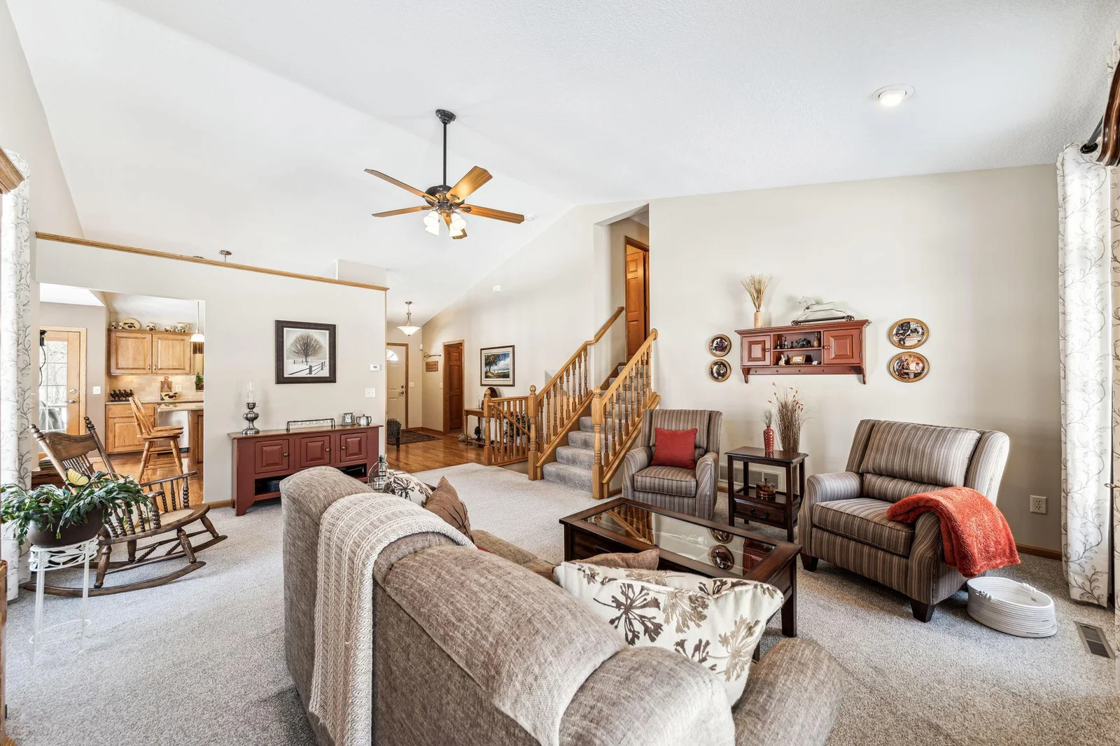 The vaulted living room is a great place to relax and enjoy the views of the backyard.