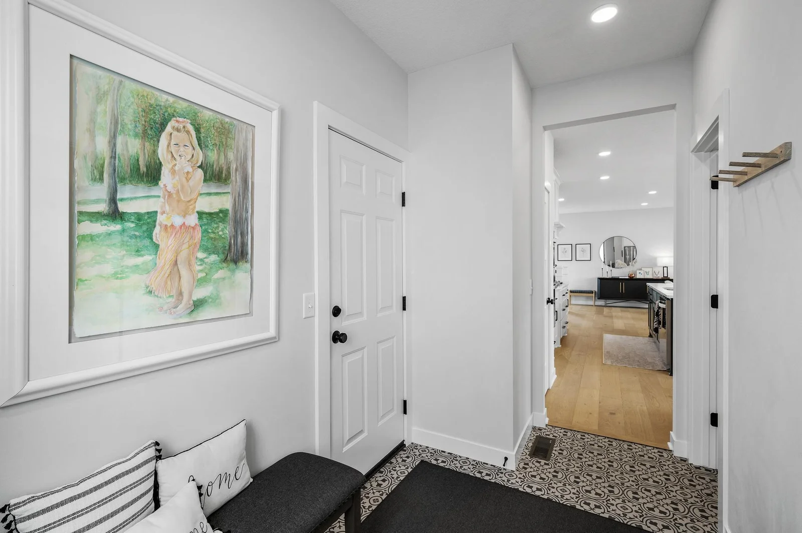 Behind this door is your three car garage! Kick off your shoes here and put them away in your coat closet.