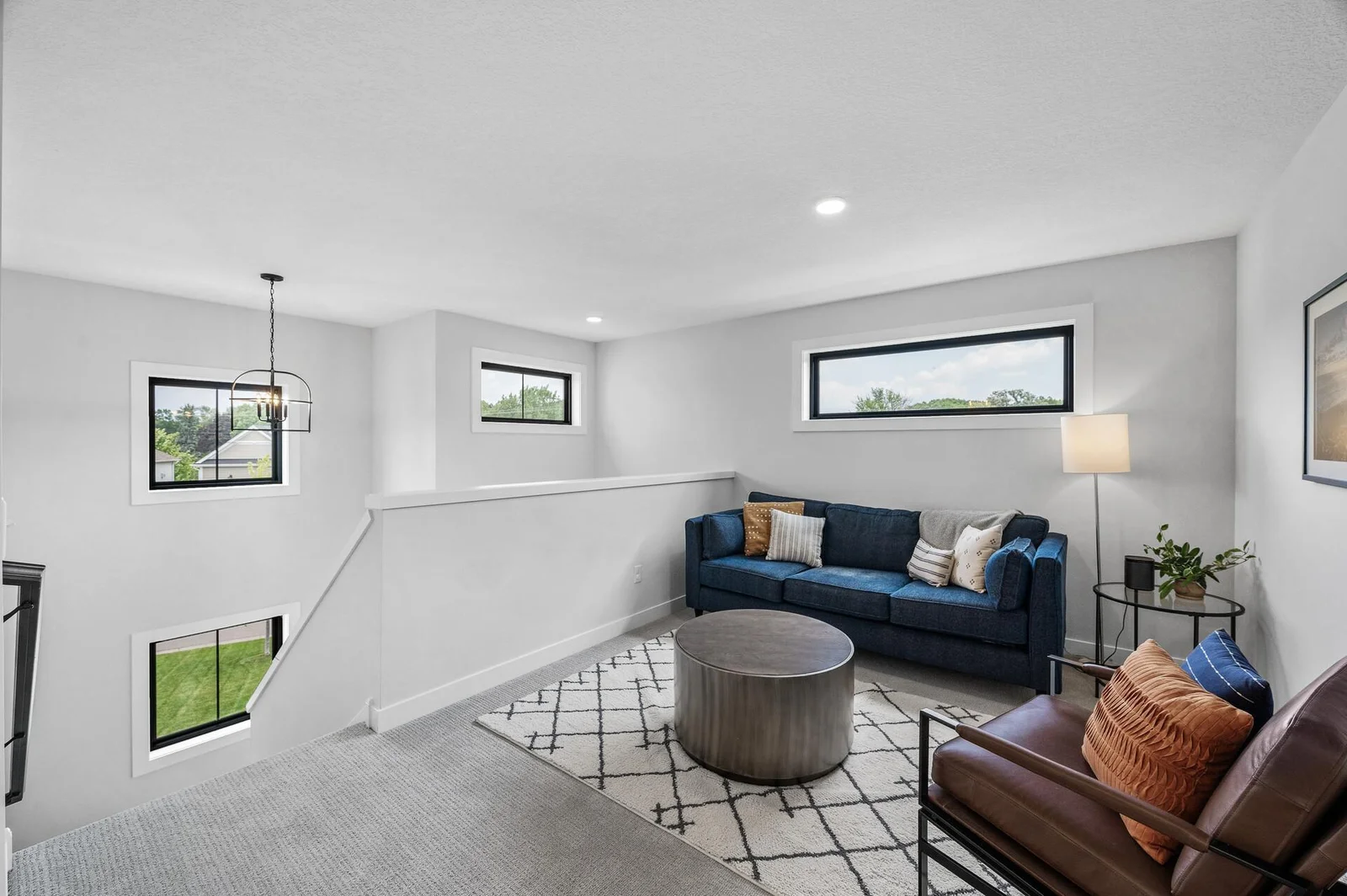 As you head upstairs, upgraded carpet underneath your feet! Loft space is a great space to chill out.