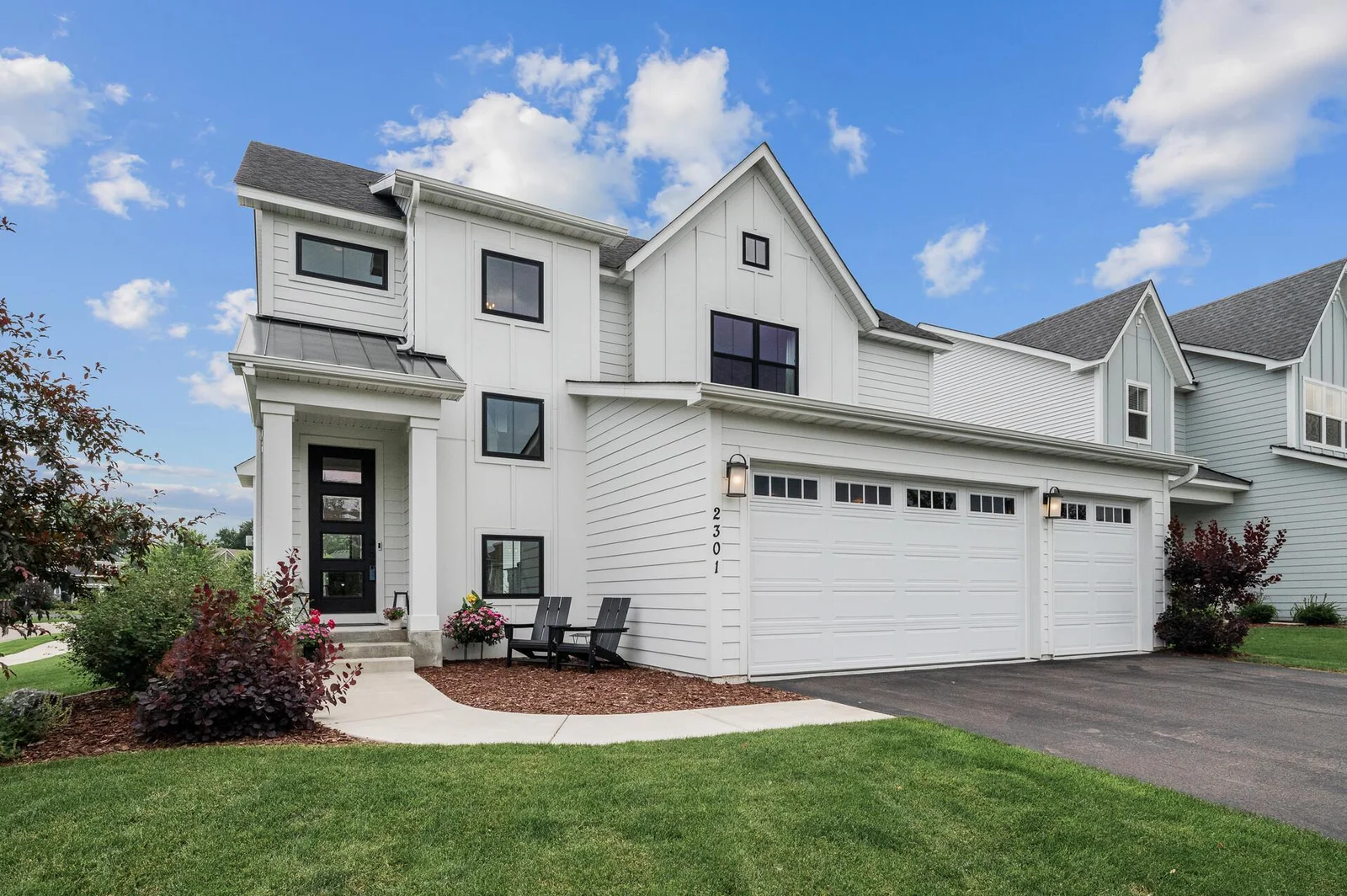 This is the Newport floor plan, one of the more efficient two-story layouts in the community at a competitive price point! Note how sharp the home looks with the white siding and black windows. Don't miss the 10-foot garage doors!